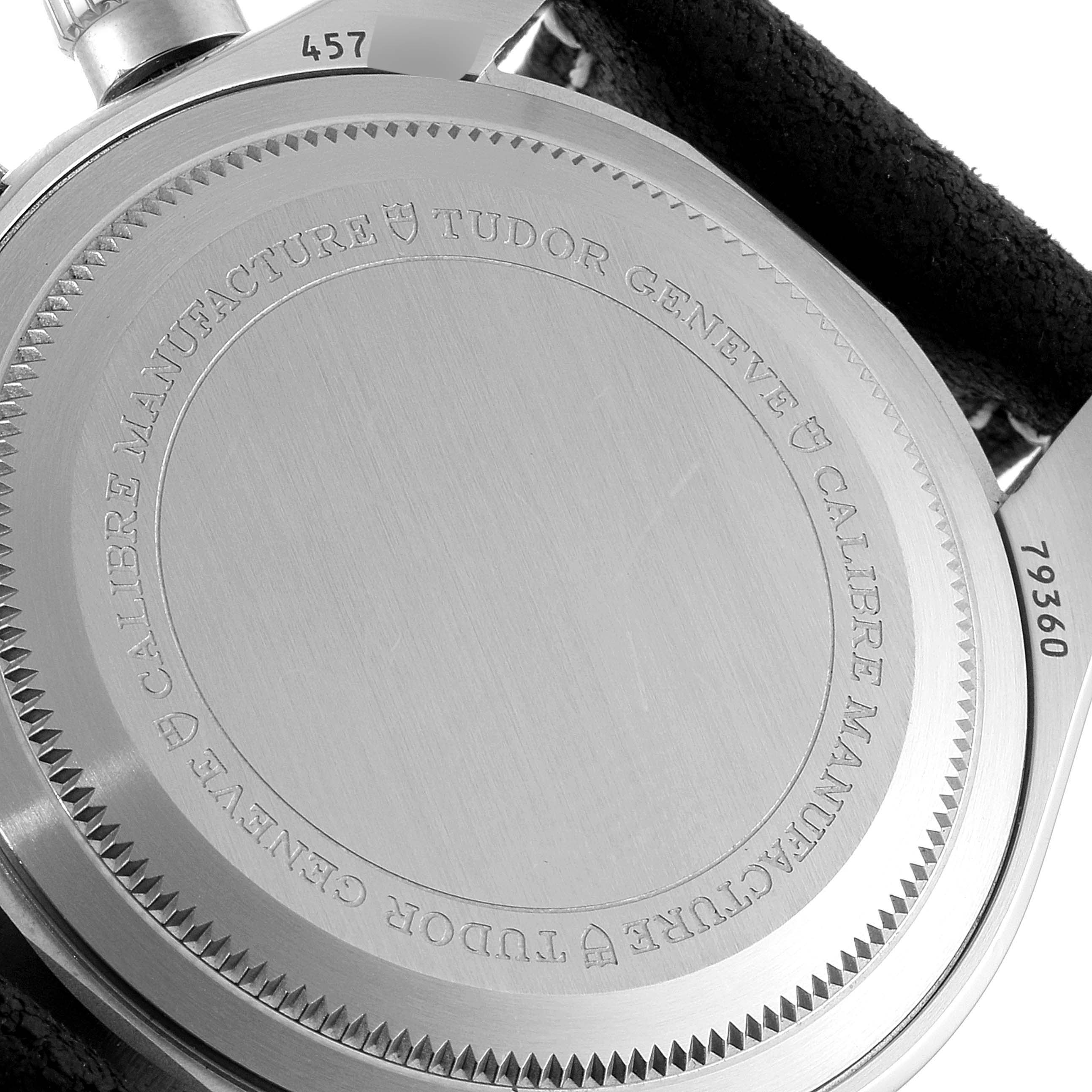 The image shows the case back of the Tudor Heritage Black Bay 79360N Men
s Stainless Steel White Dial 79360N Men
s Stainless Steel White Dial watch, displaying the engravings and part of the lug.