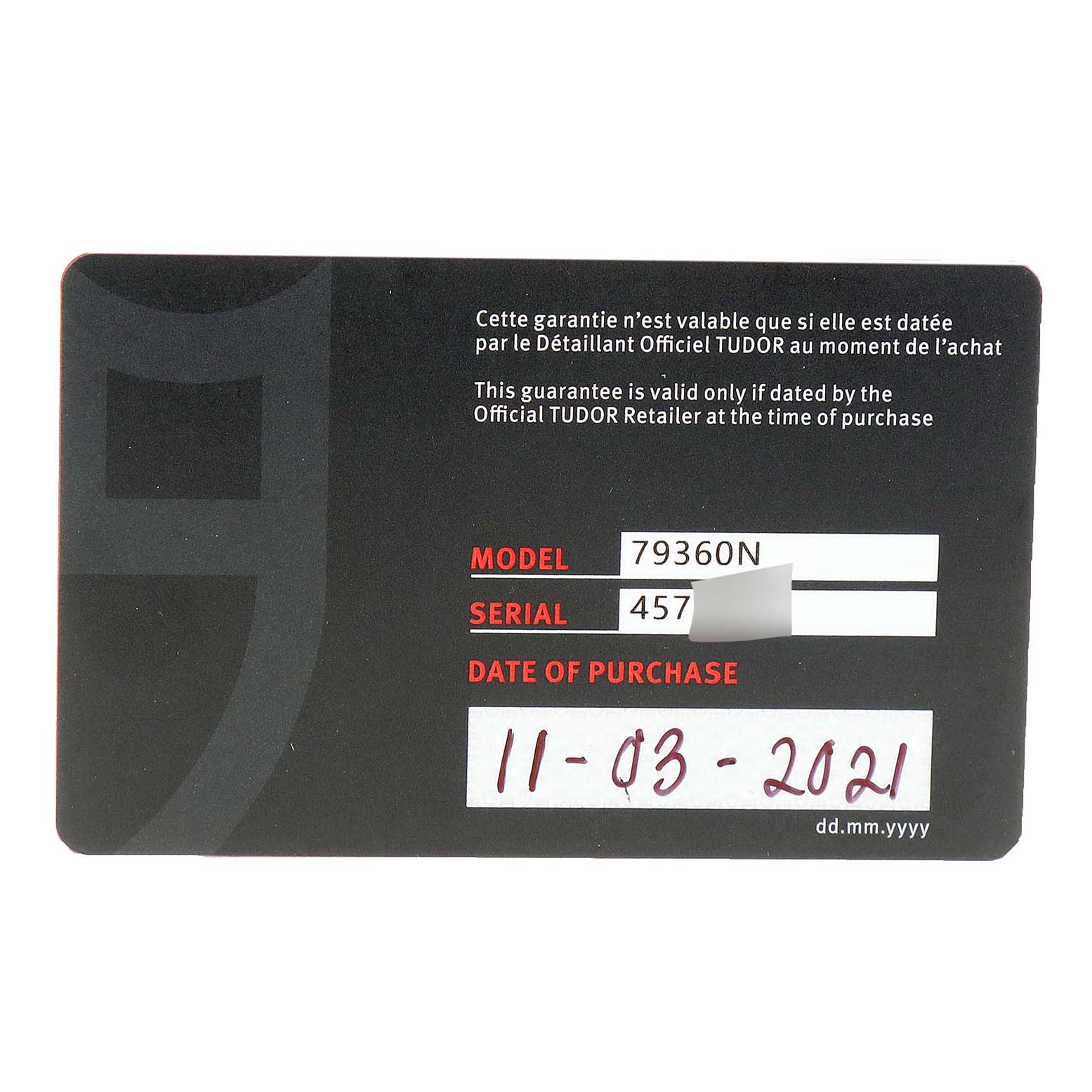 This image shows a warranty card for the Tudor Heritage Black Bay 79360N Men
s Stainless Steel White Dial 79360N Men
s Stainless Steel White Dial model 79360N, including the serial number and date of purchase.