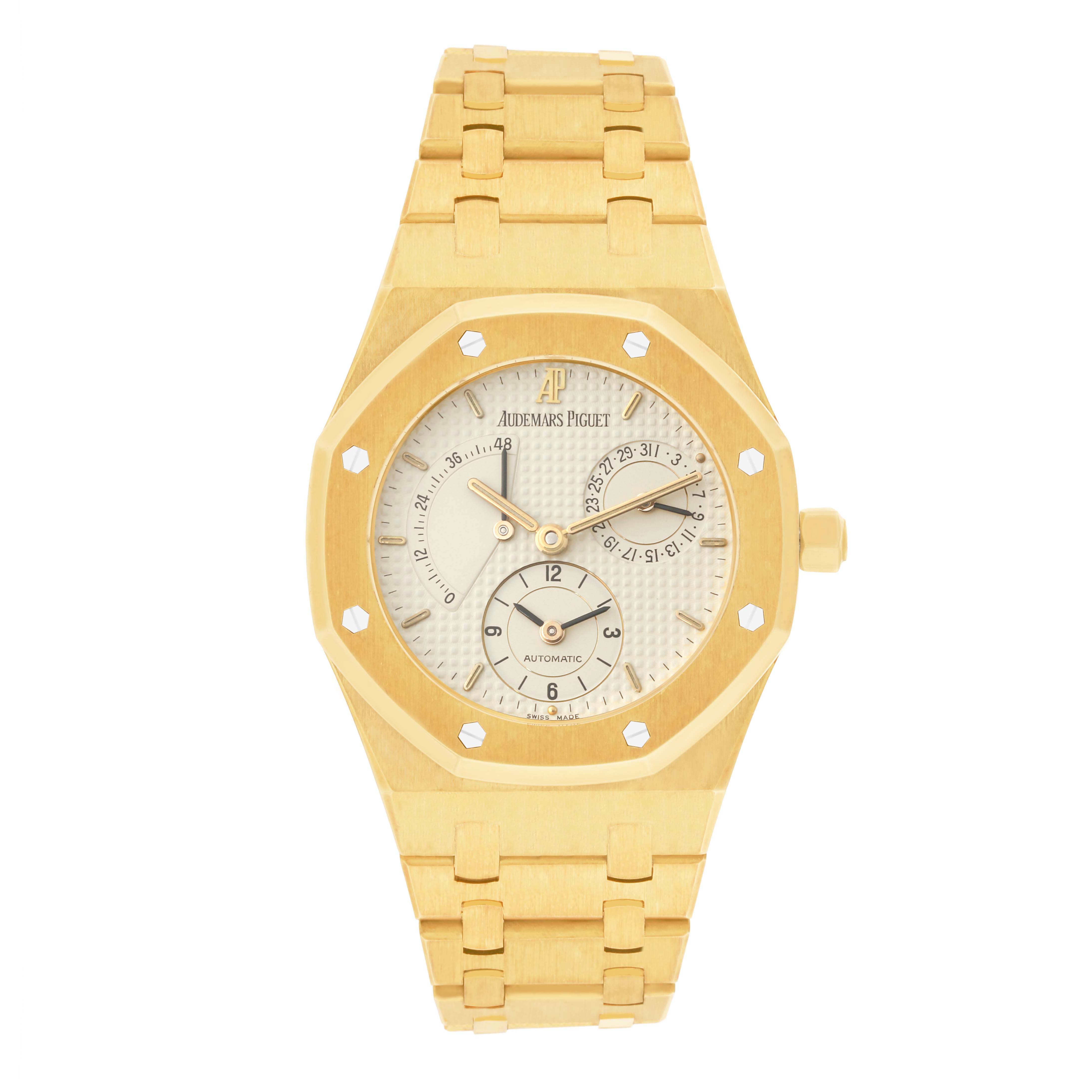 The Audemars Piguet Royal Oak 25730BA Men's Yellow Gold Silver Dial 25730BA Men's Yellow Gold Silver Dial watch is shown from the front, displaying the face, bezel, and bracelet.