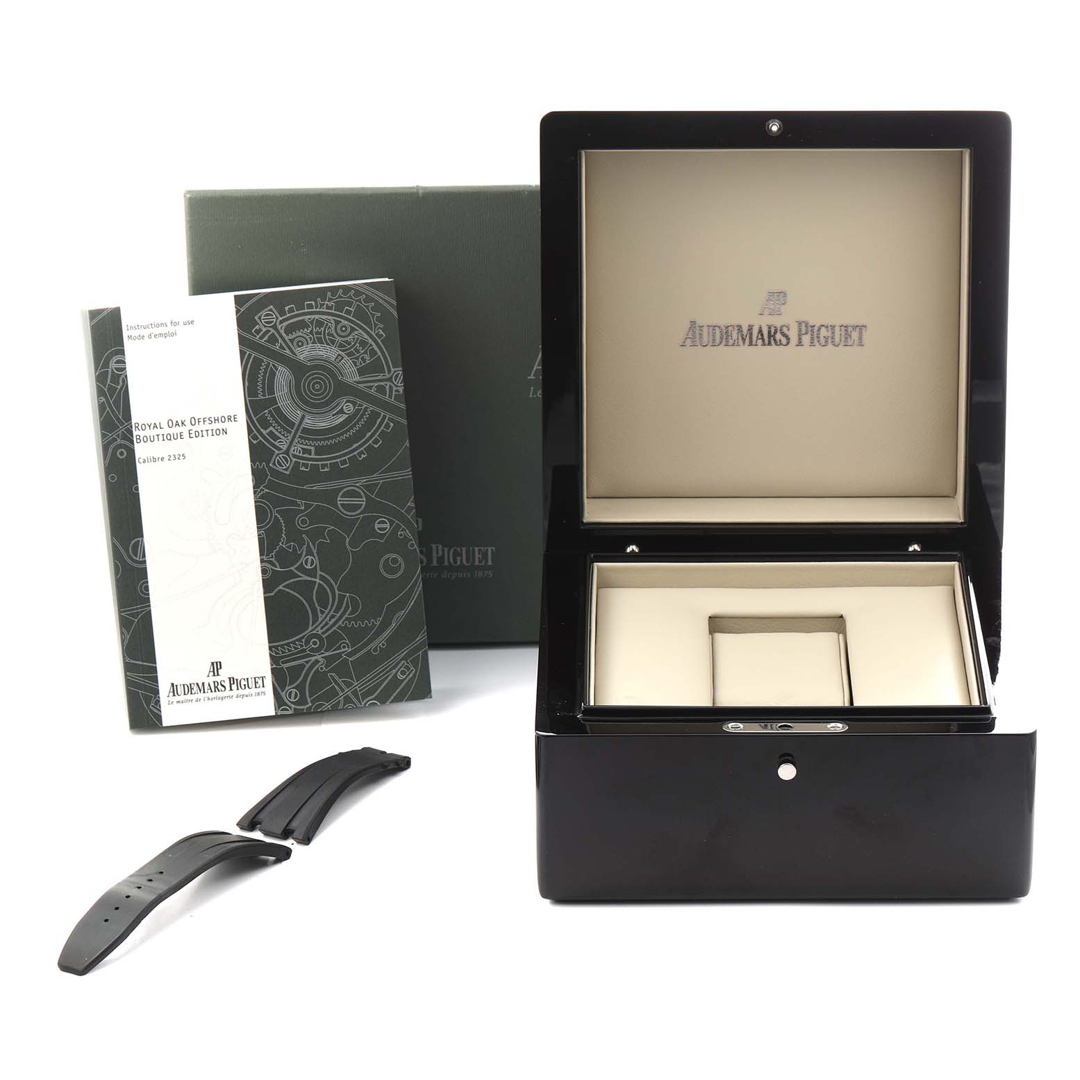 The image shows an open Audemars Piguet Royal Oak Offshore 15701ST.OO.D002CA.03 Men
s Stainless Steel Black Dial 15701ST.OO.D002CA.03 Men
s Stainless Steel Black Dial box, booklet, and two straps.