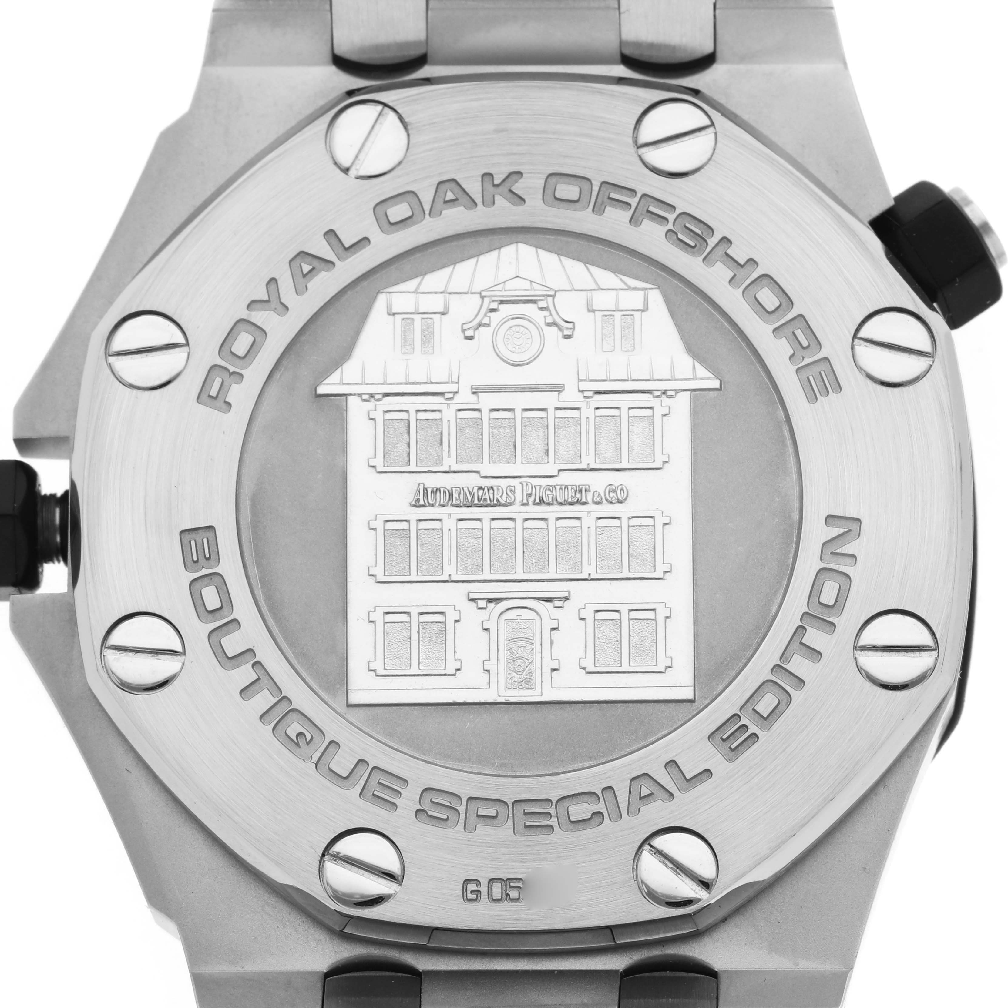 The image shows the back of a Royal Oak Offshore by Audemars Piguet, highlighting the engraved details and screws.