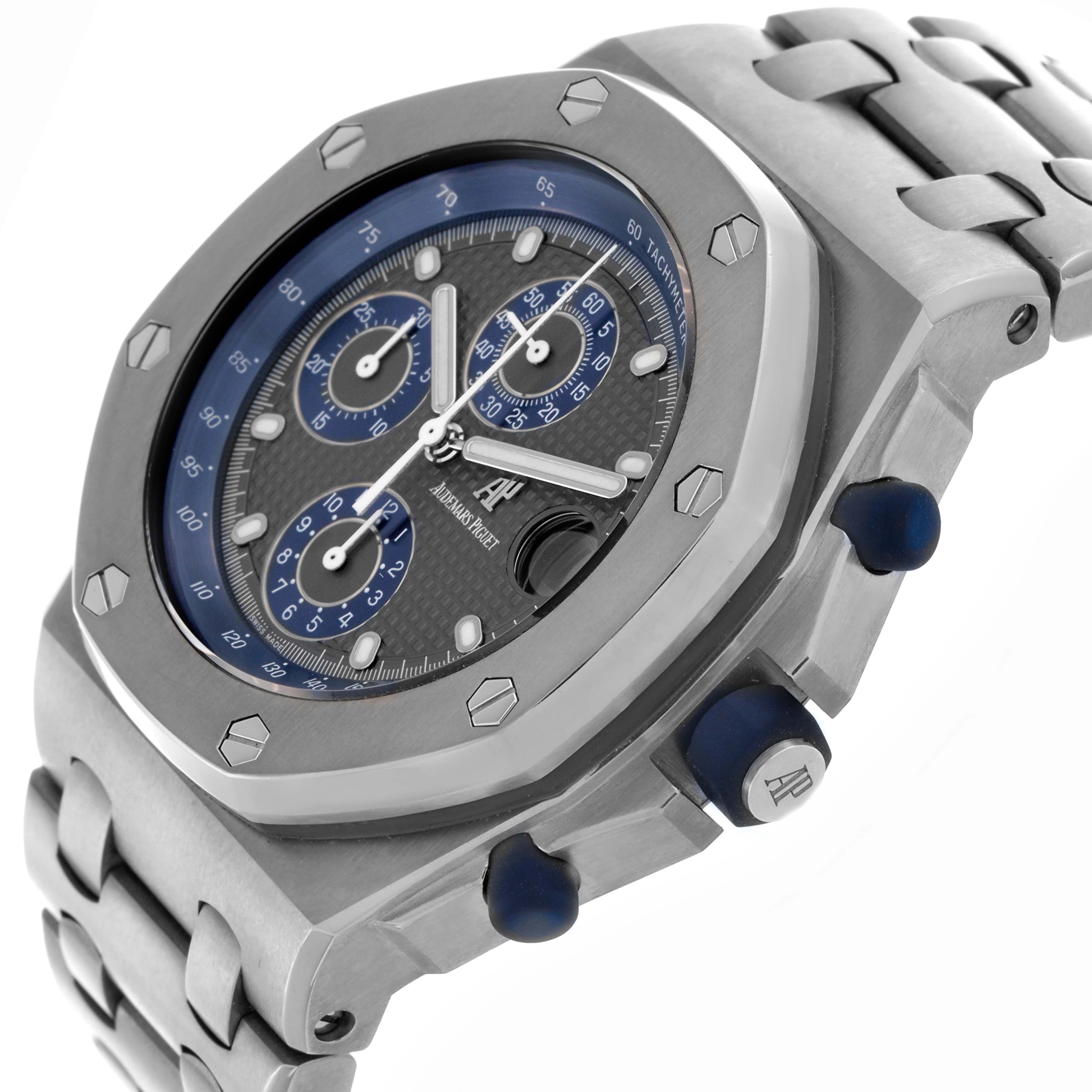 The image shows the Audemars Piguet Royal Oak Offshore 25721TI.OO.10000TI.301 Men
s Titanium Grey Dial 25721TI.OO.10000TI.301 Men
s Titanium Grey Dial watch at a slight angle, highlighting the bezel, dial, and side pushers.