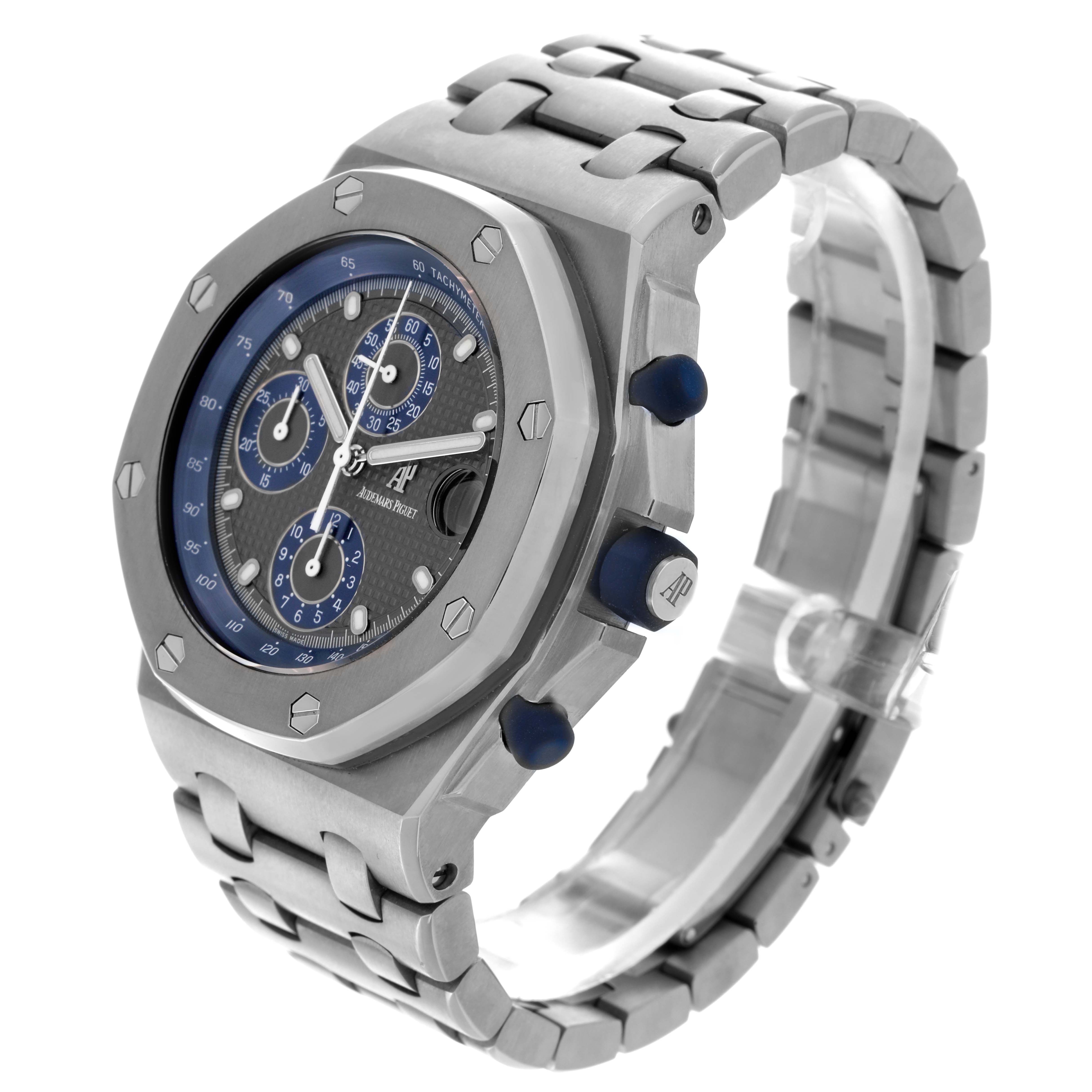 The Audemars Piguet Royal Oak Offshore 25721TI.OO.10000TI.301 Men
s Titanium Grey Dial 25721TI.OO.10000TI.301 Men
s Titanium Grey Dial is shown at a three-quarter angle, highlighting the face, bezel, and side details.