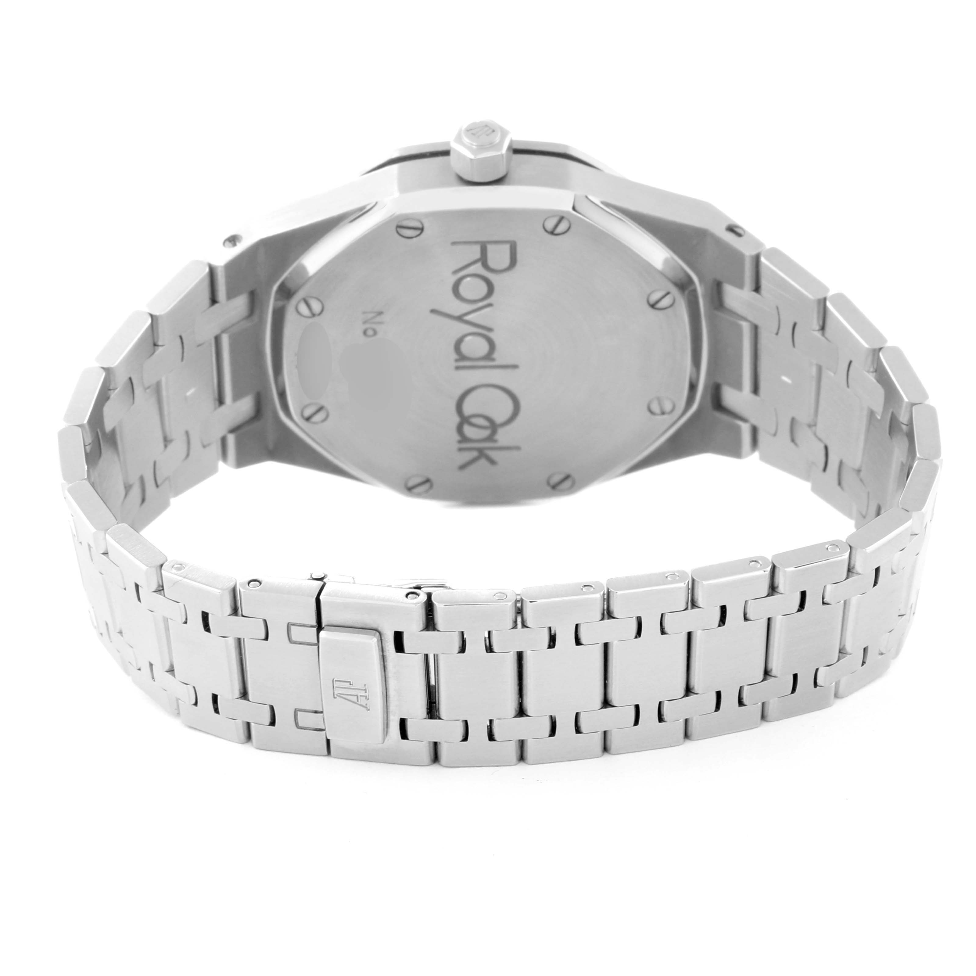 This image shows the back and the bracelet of a Royal Oak watch by Audemars Piguet, emphasizing the clasp and case back.