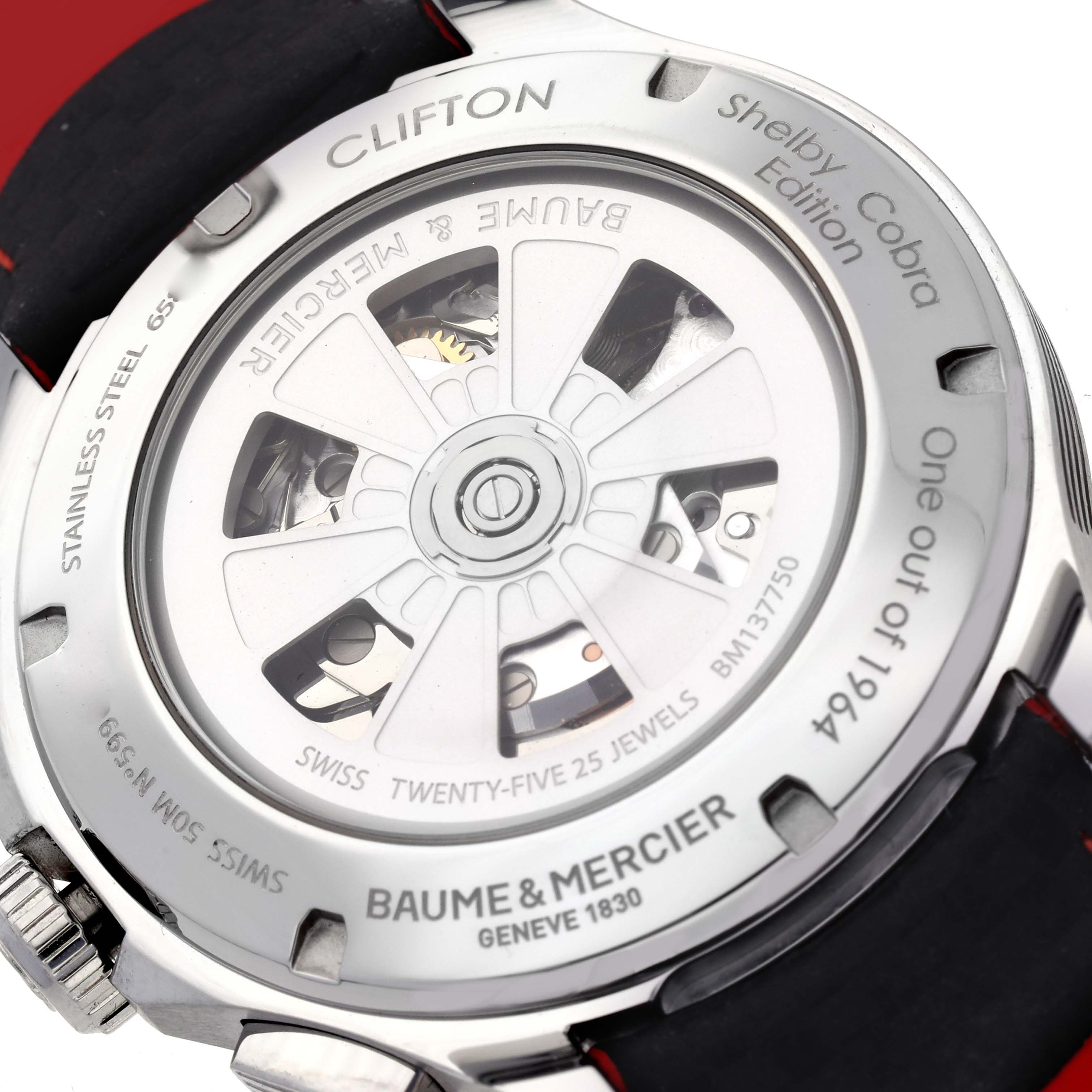 The image shows the back case of a Baume 
Mercier Clifton MOA10342 Men
s Stainless Steel Silver Dial MOA10342 Men
s Stainless Steel Silver Dial watch, highlighting the rotor and engraved details.