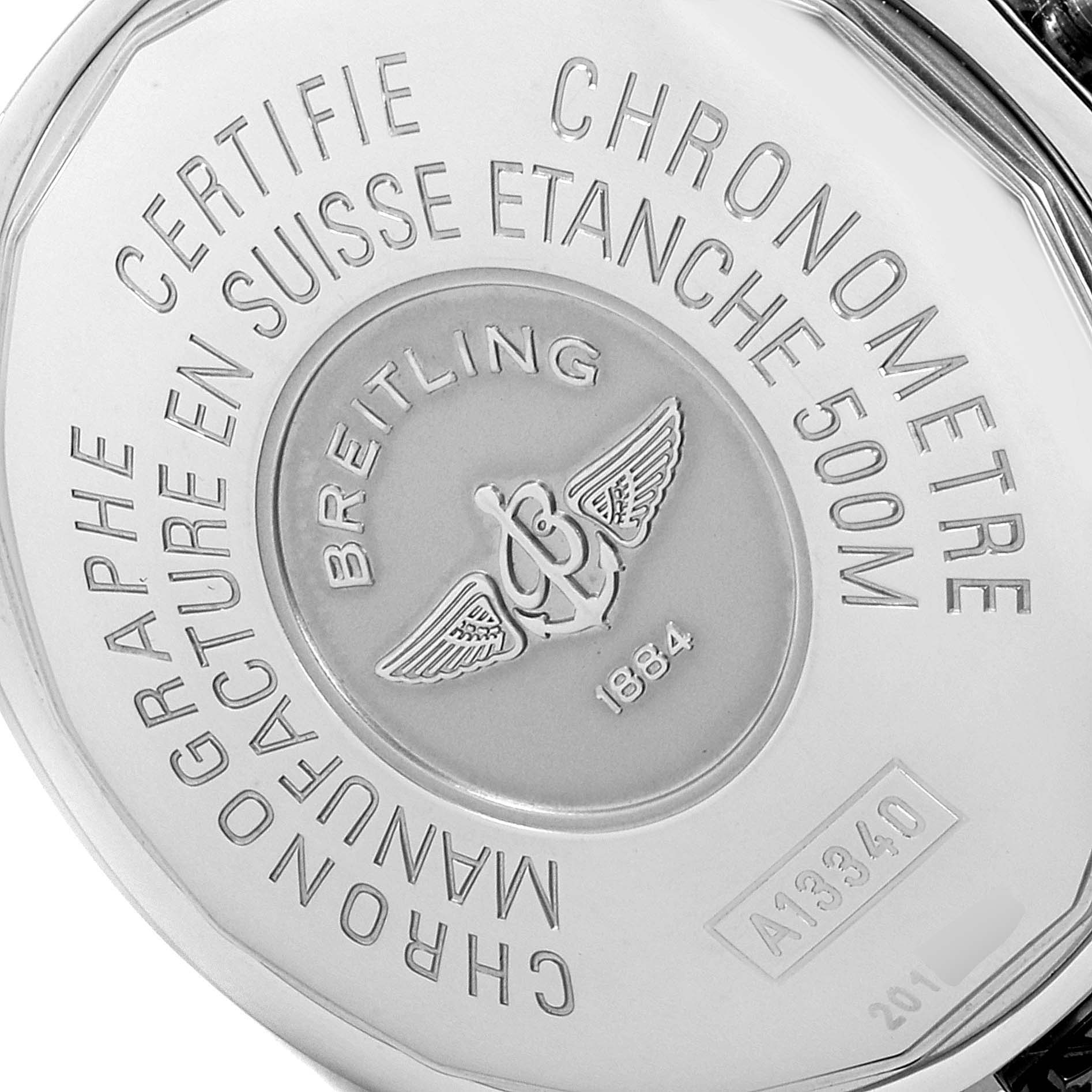 This close-up image shows the engraved case back of the Breitling Superocean A13340 Men's Stainless Steel Beige Dial A13340 Men's Stainless Steel Beige Dial watch, highlighting certification details.