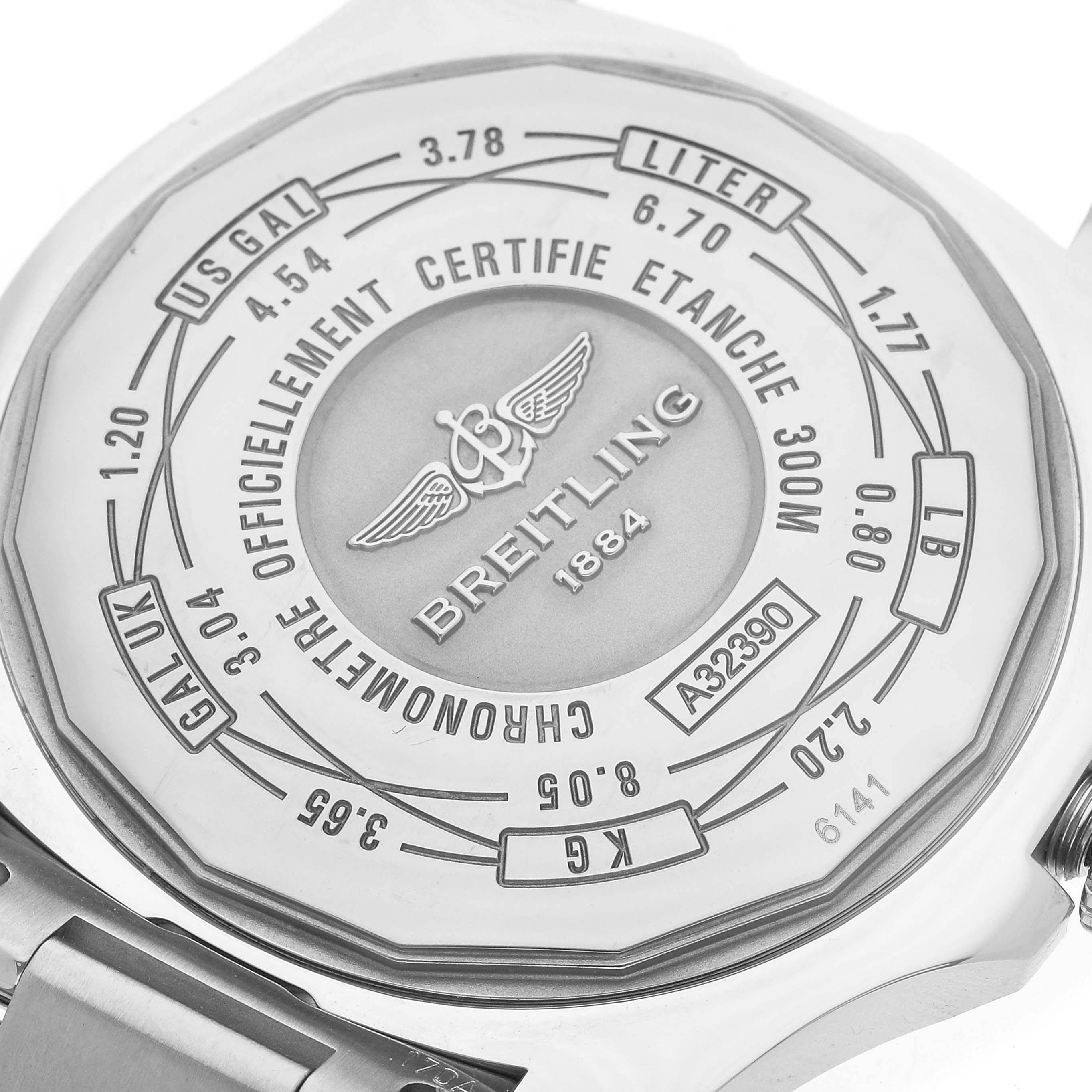 The image shows the back case of a Breitling Avenger A3239011/C930 Men's Stainless Steel Mother of Pearl Dial A3239011/C930 Men's Stainless Steel Mother of Pearl Dial watch with detailed engravings and a stainless steel bracelet attachment.