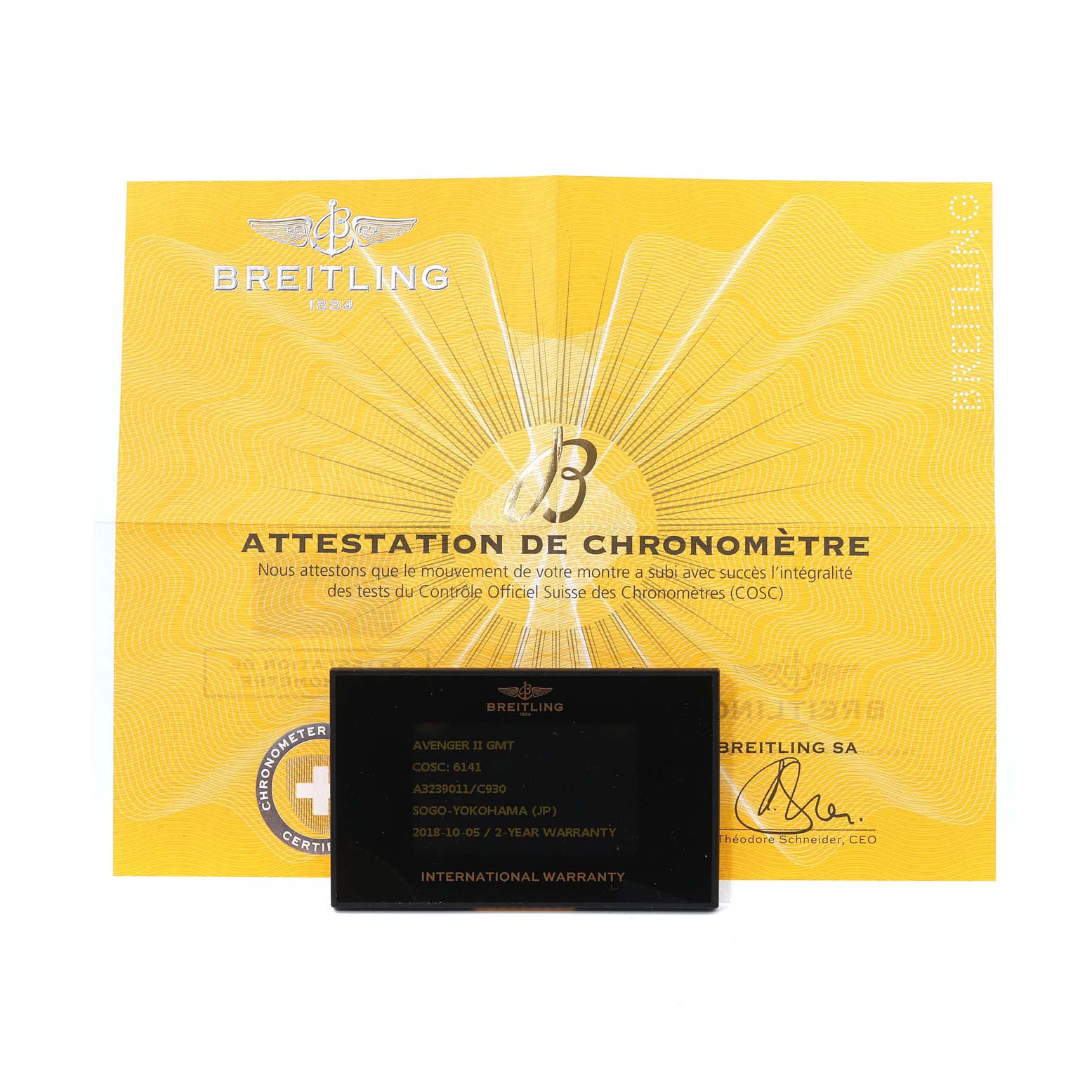 The image shows a Breitling Avenger A3239011/C930 Men's Stainless Steel Mother of Pearl Dial A3239011/C930 Men's Stainless Steel Mother of Pearl Dial model certificate of authenticity and a warranty card.