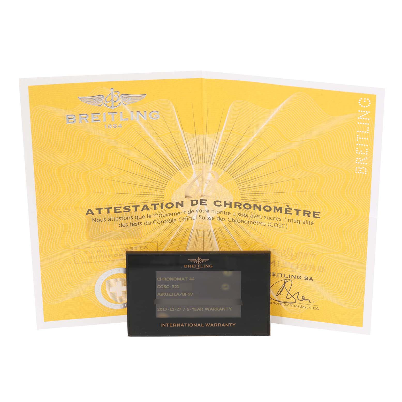 The image shows the certificate and warranty card for the Breitling Chronomat AB01111A/BF68 Men
s Stainless Steel Mother of Pearl Dial AB01111A/BF68 Men
s Stainless Steel Mother of Pearl Dial model, angled slightly forward.