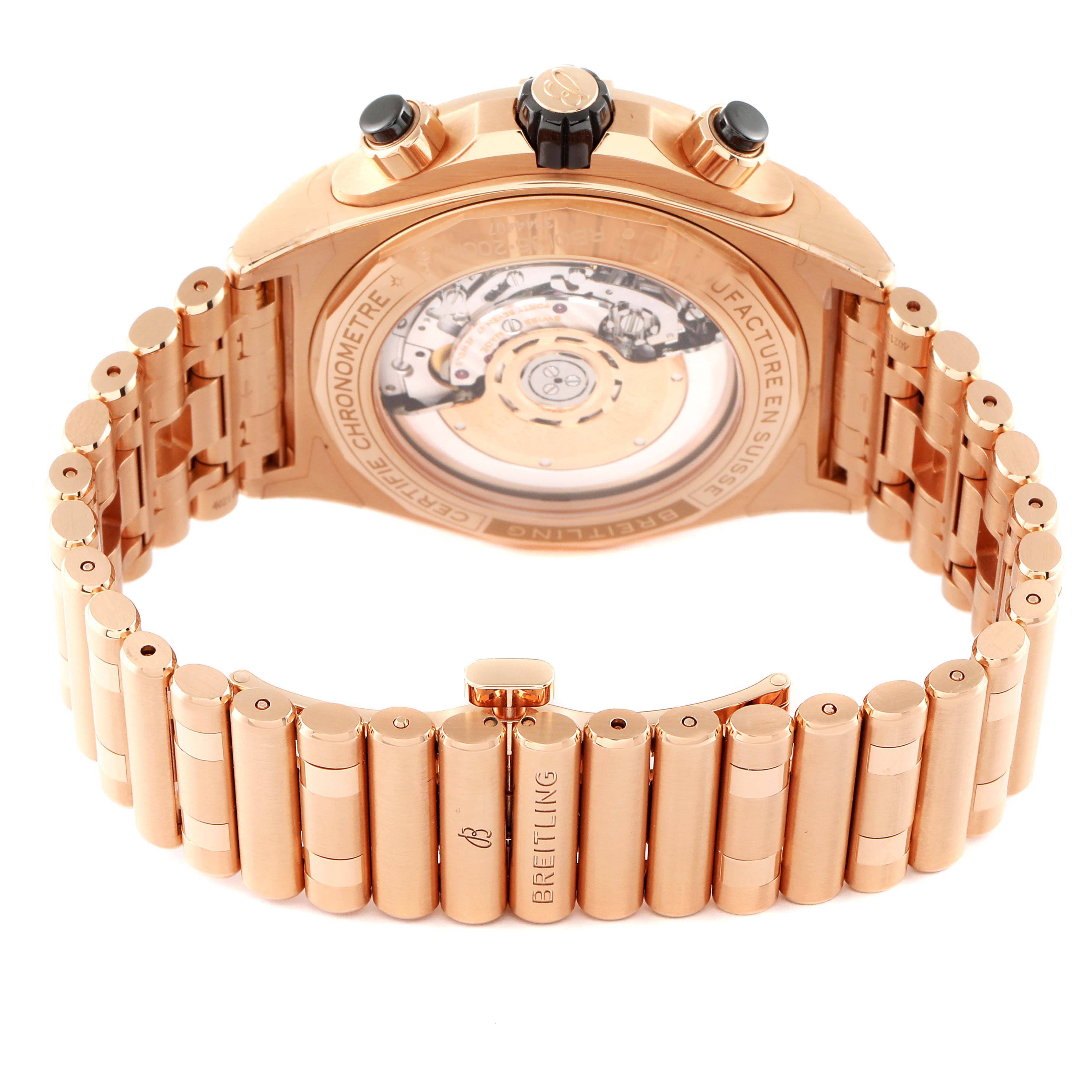 The image shows the back and bracelet of the Breitling Chronomat RB0136E31Q1R1 Men's Rose Gold Brown Dial RB0136E31Q1R1 Men's Rose Gold Brown Dial watch, highlighting its rose gold case and exhibition case back.