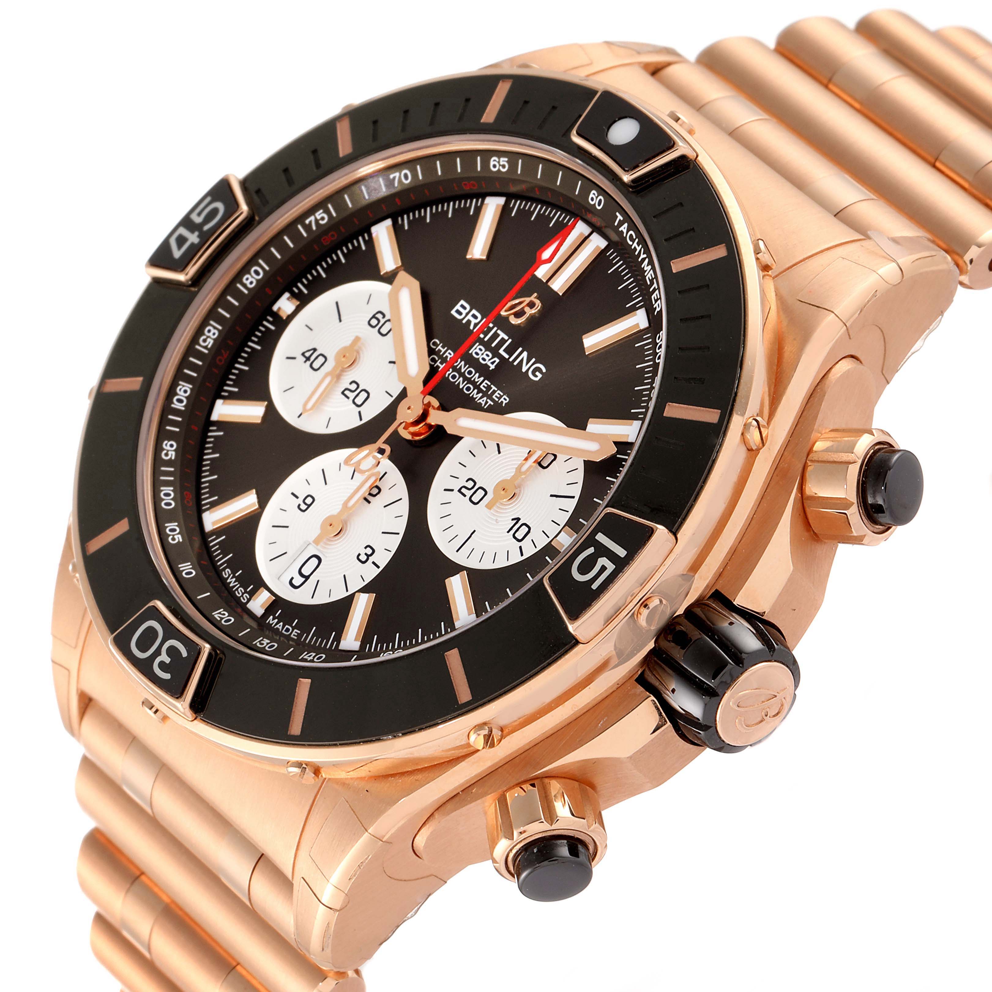 The image shows a close-up angled view of a Breitling Chronomat RB0136E31Q1R1 Men's Rose Gold Brown Dial RB0136E31Q1R1 Men's Rose Gold Brown Dial watch, highlighting the dial, bezel, pushers, and a part of the bracelet.