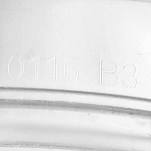 This image shows a close-up of the serial number engraving inside a Breitling Navitimer AB0121C4-C920-731P Men's Stainless Steel Black Dial AB0121C4-C920-731P Men's Stainless Steel Black Dial watch case.