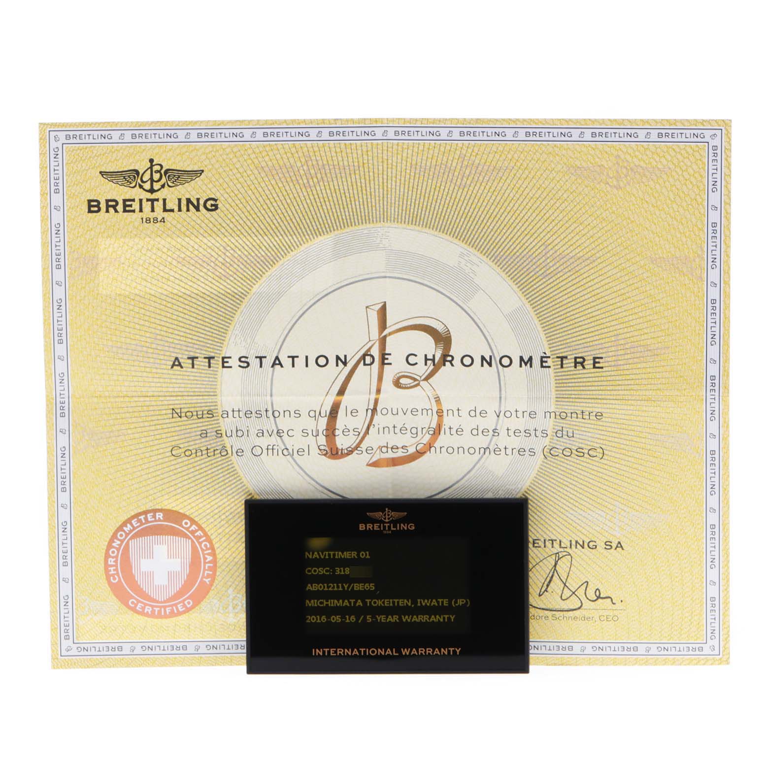 The image shows a Breitling Navitimer AB0121C4-C920-731P Men's Stainless Steel Black Dial AB0121C4-C920-731P Men's Stainless Steel Black Dial certificate of chronometer performance and an international warranty card.