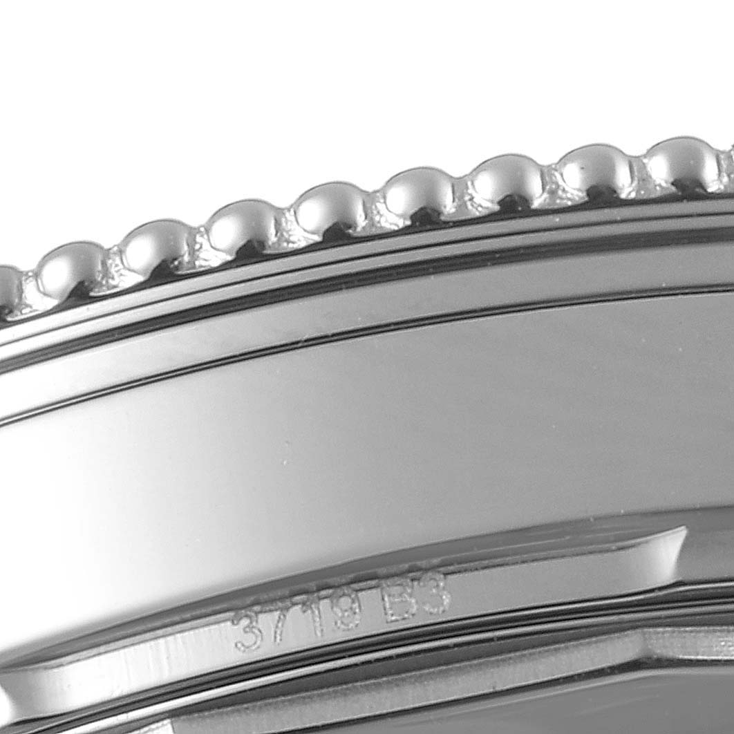 This image shows a close-up of the bezel edge on a Breitling Navitimer A17326 Men
s Stainless Steel Silver Dial A17326 Men
s Stainless Steel Silver Dial watch.