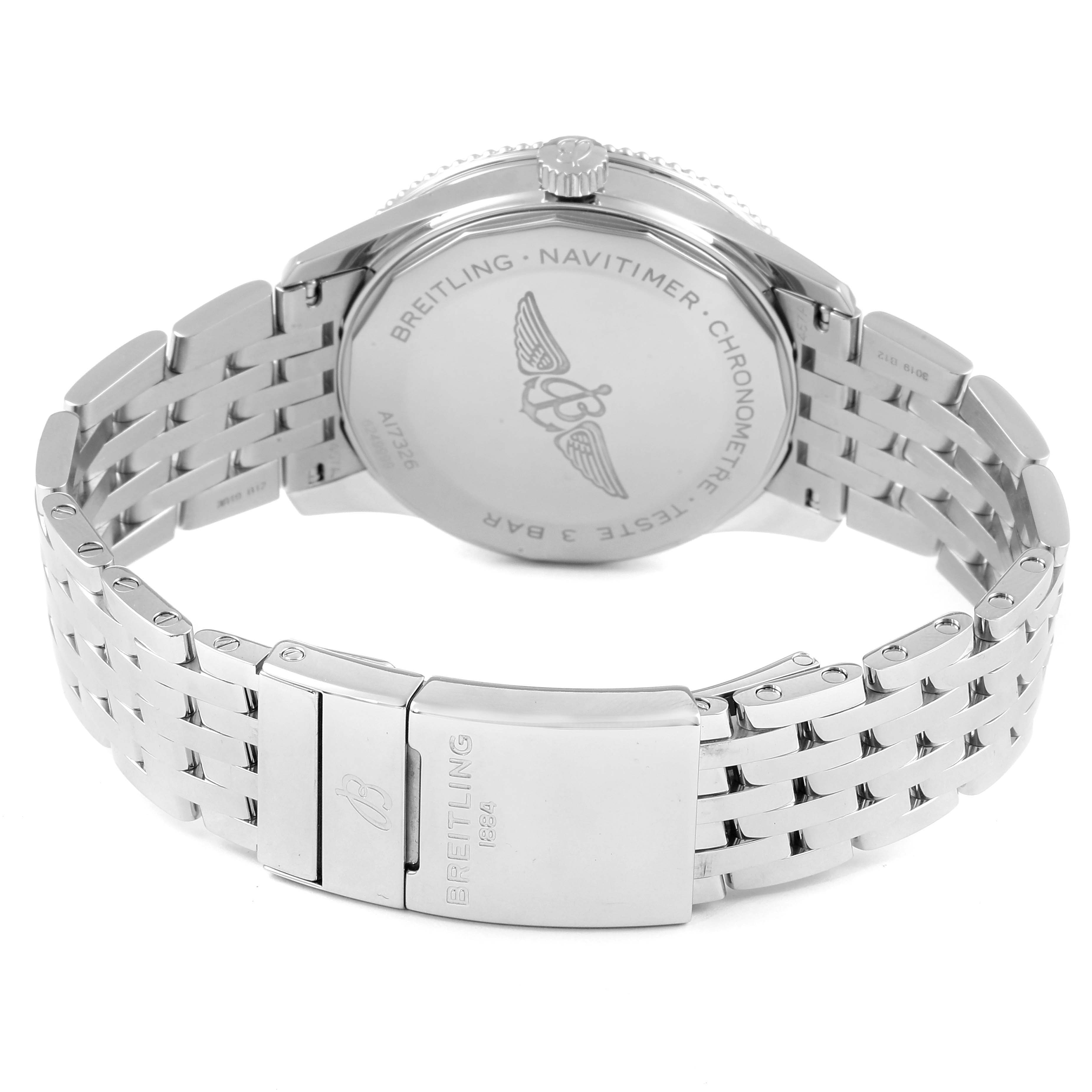 The image shows the back of a Breitling Navitimer A17326 Men
s Stainless Steel Silver Dial A17326 Men
s Stainless Steel Silver Dial watch, featuring its case back and metal bracelet clasp.