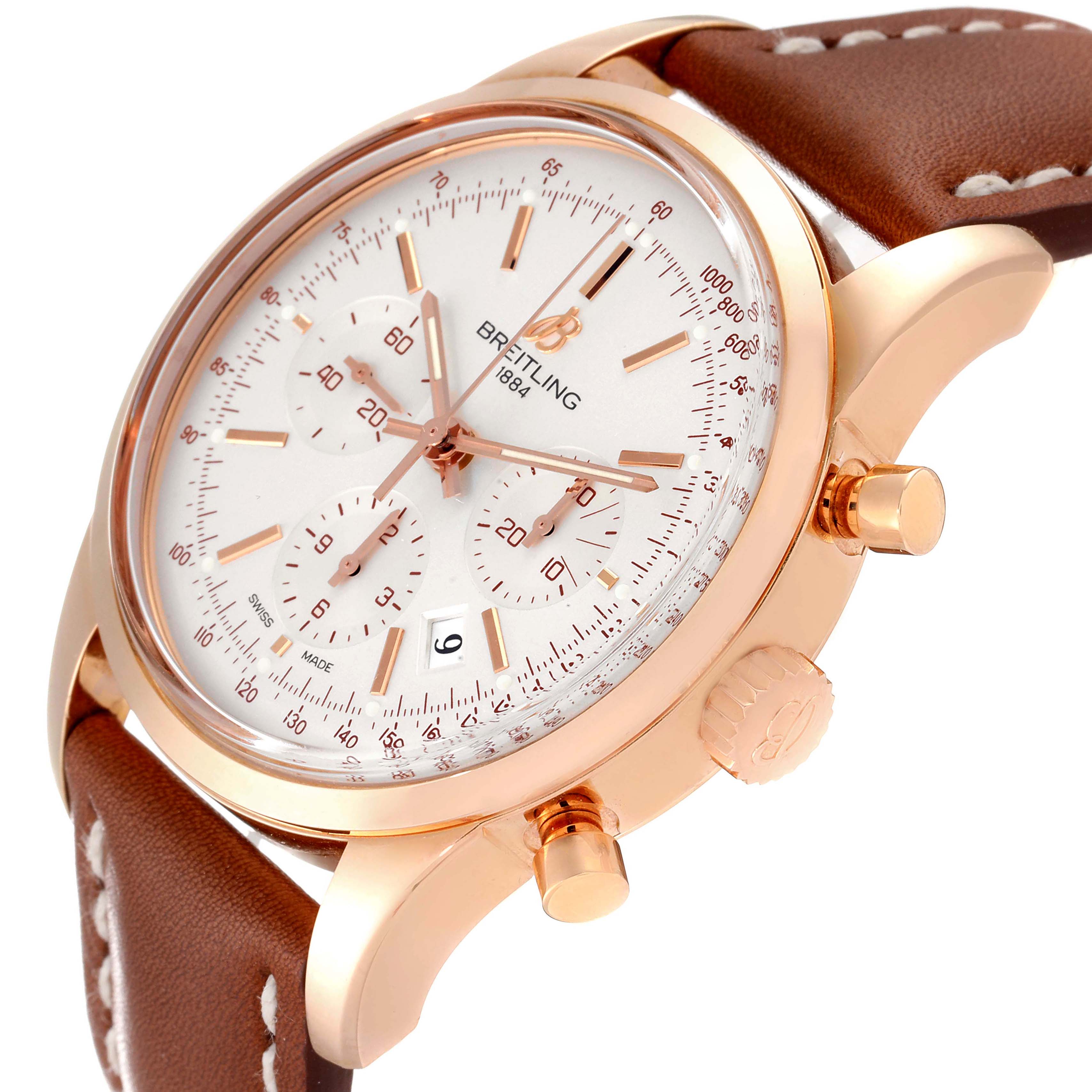 The image shows a Breitling Transocean RB0152 Men's Rose Gold Silver Dial RB0152 Men's Rose Gold Silver Dial watch from a side angle, highlighting the dial, crown, pushers, and leather strap.