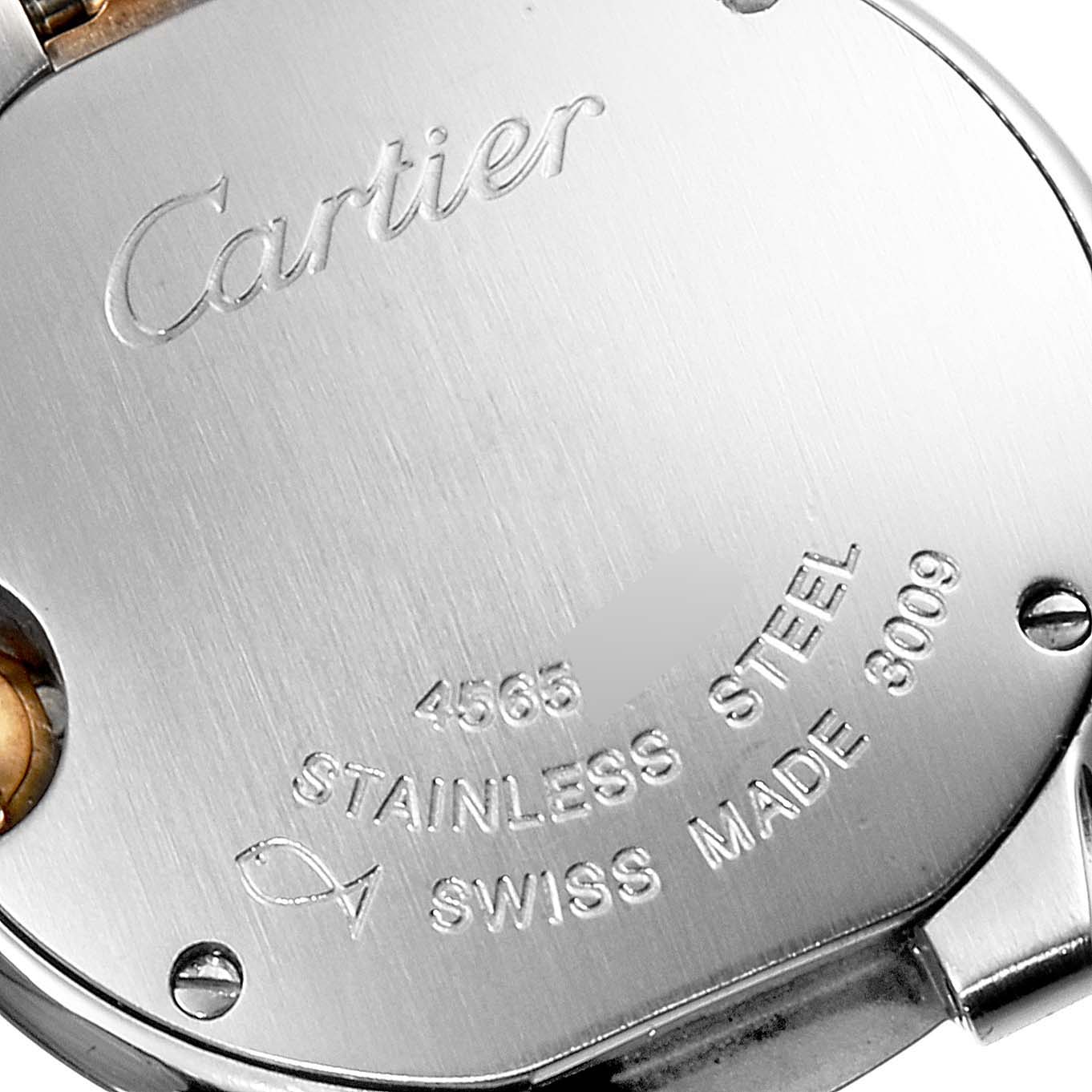 The image shows the engraved case back of a Ballon Bleu model by Cartier, displaying the brand name and material details.