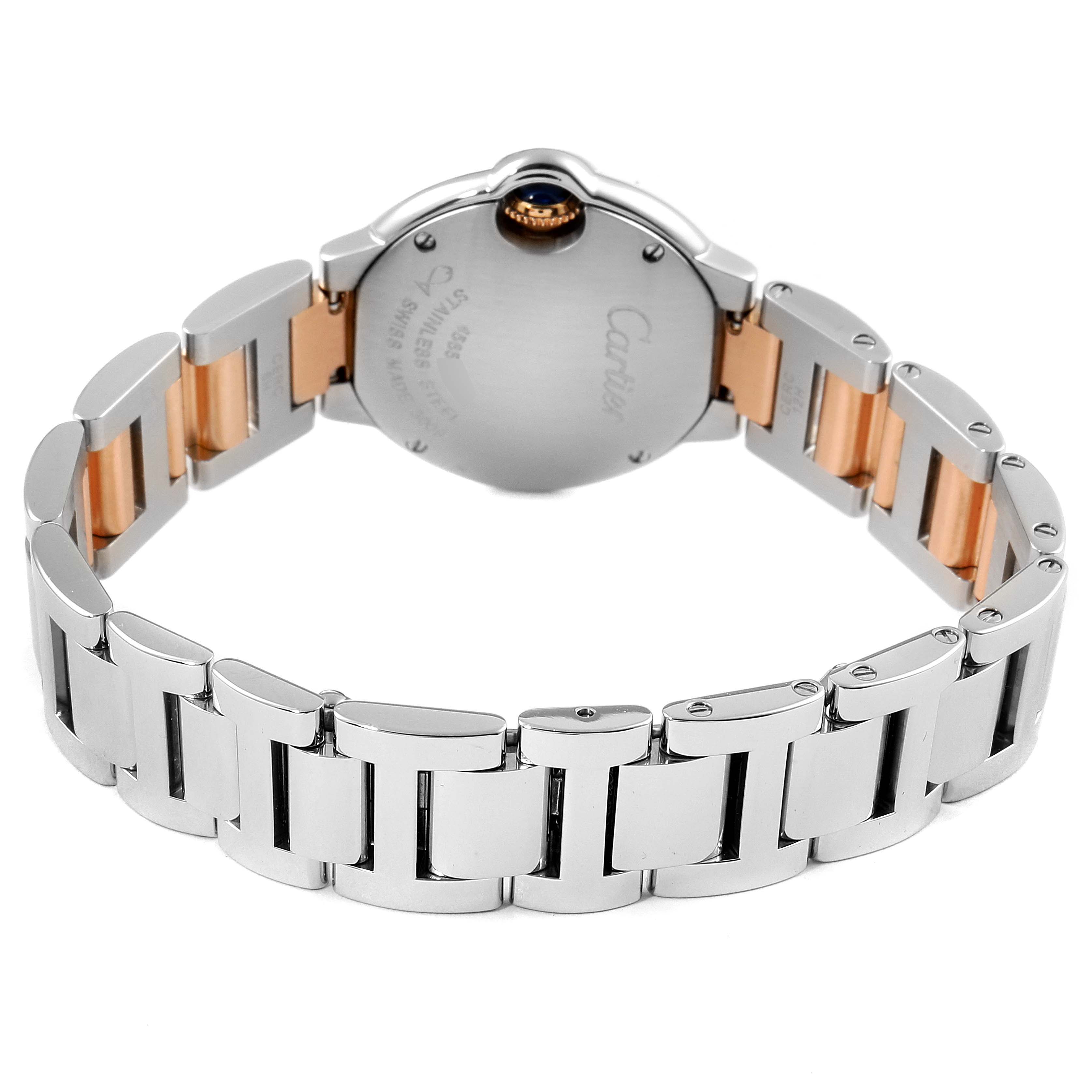 The image shows the back of the Cartier Ballon Bleu WE902030 Women
s Steel and Gold (two tone) Silver Dial WE902030 Women
s Steel and Gold (two tone) Silver Dial watch, highlighting the stainless steel and rose gold bracelet.