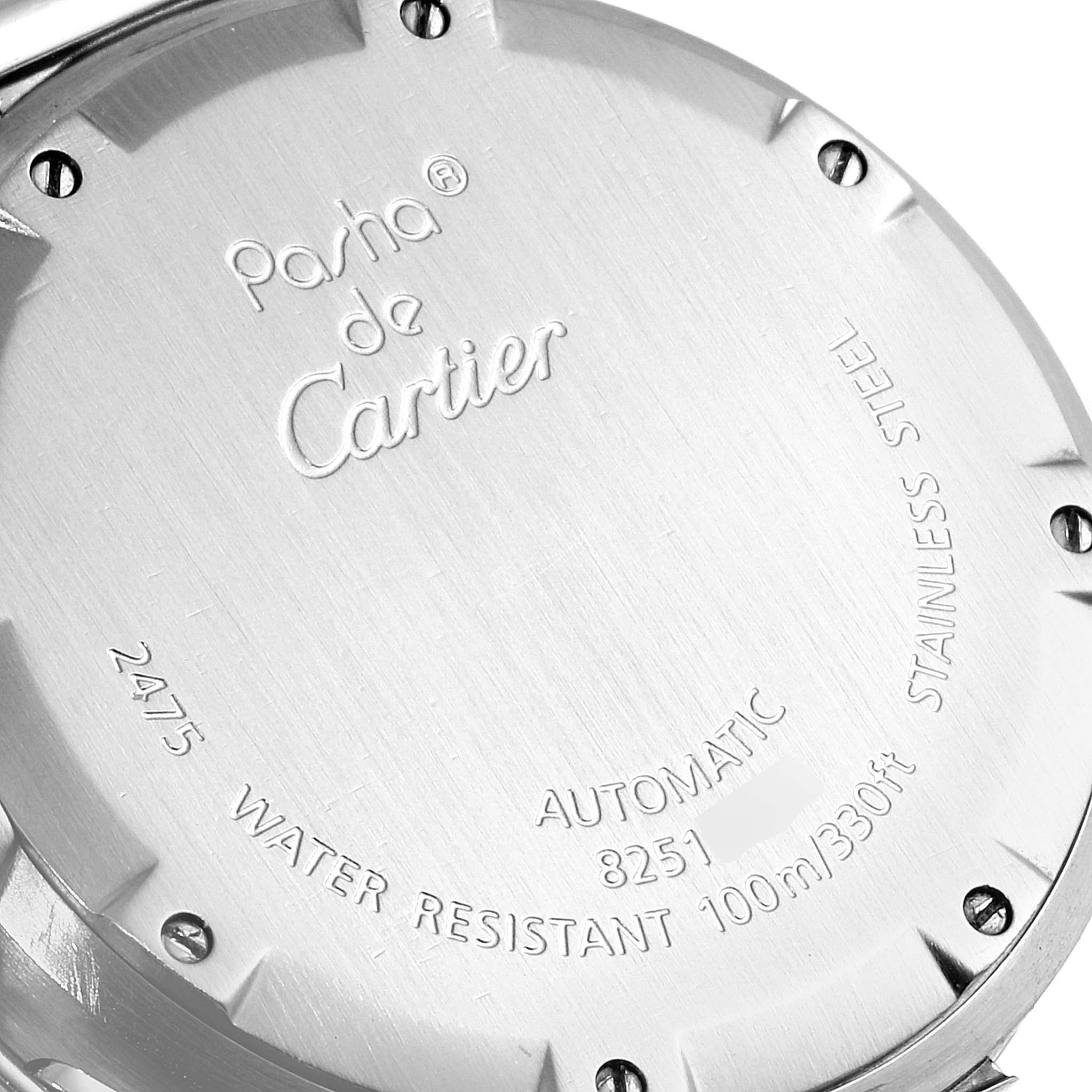 The image shows the back of a Cartier Pasha W31058M7 Women's Stainless Steel Pink Dial W31058M7 Women's Stainless Steel Pink Dial watch, highlighting its engravings and stainless steel case.