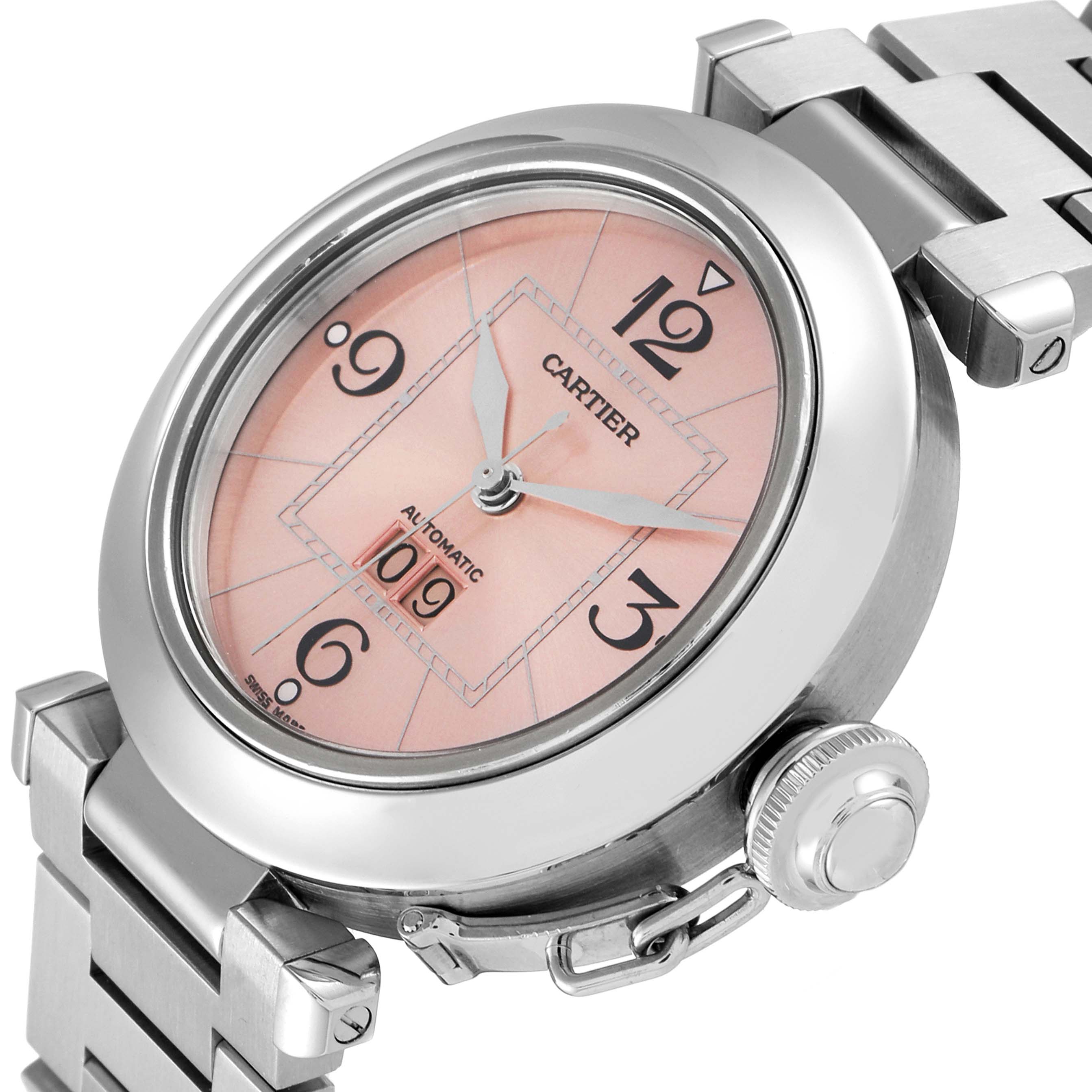 The image shows a Cartier Pasha W31058M7 Women's Stainless Steel Pink Dial W31058M7 Women's Stainless Steel Pink Dial watch at an oblique angle, highlighting the dial, crown guard, and part of the metal bracelet.