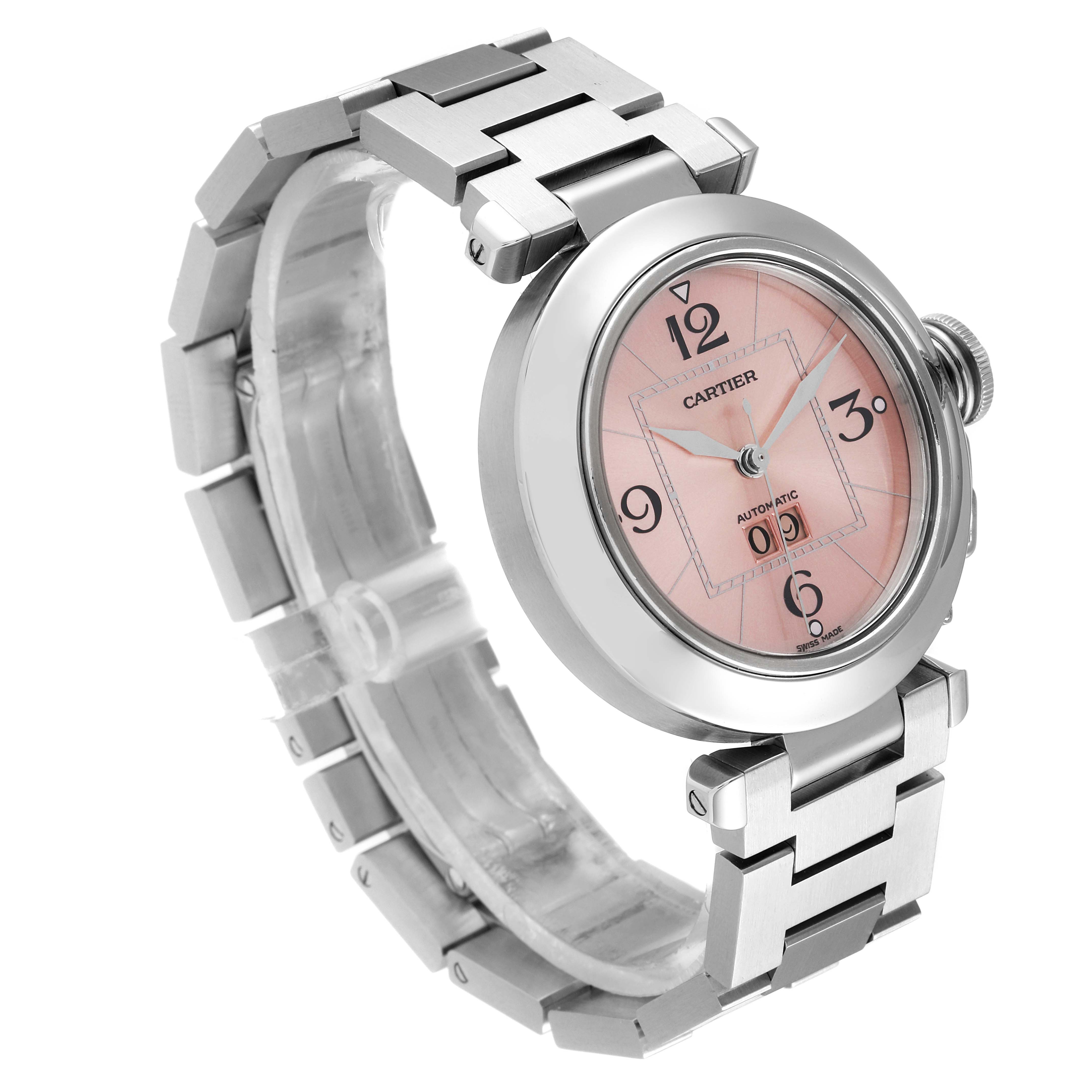 The image shows a Cartier Pasha W31058M7 Women's Stainless Steel Pink Dial W31058M7 Women's Stainless Steel Pink Dial watch with a stainless steel band and a pink face, viewed from an angle showing the side and front.