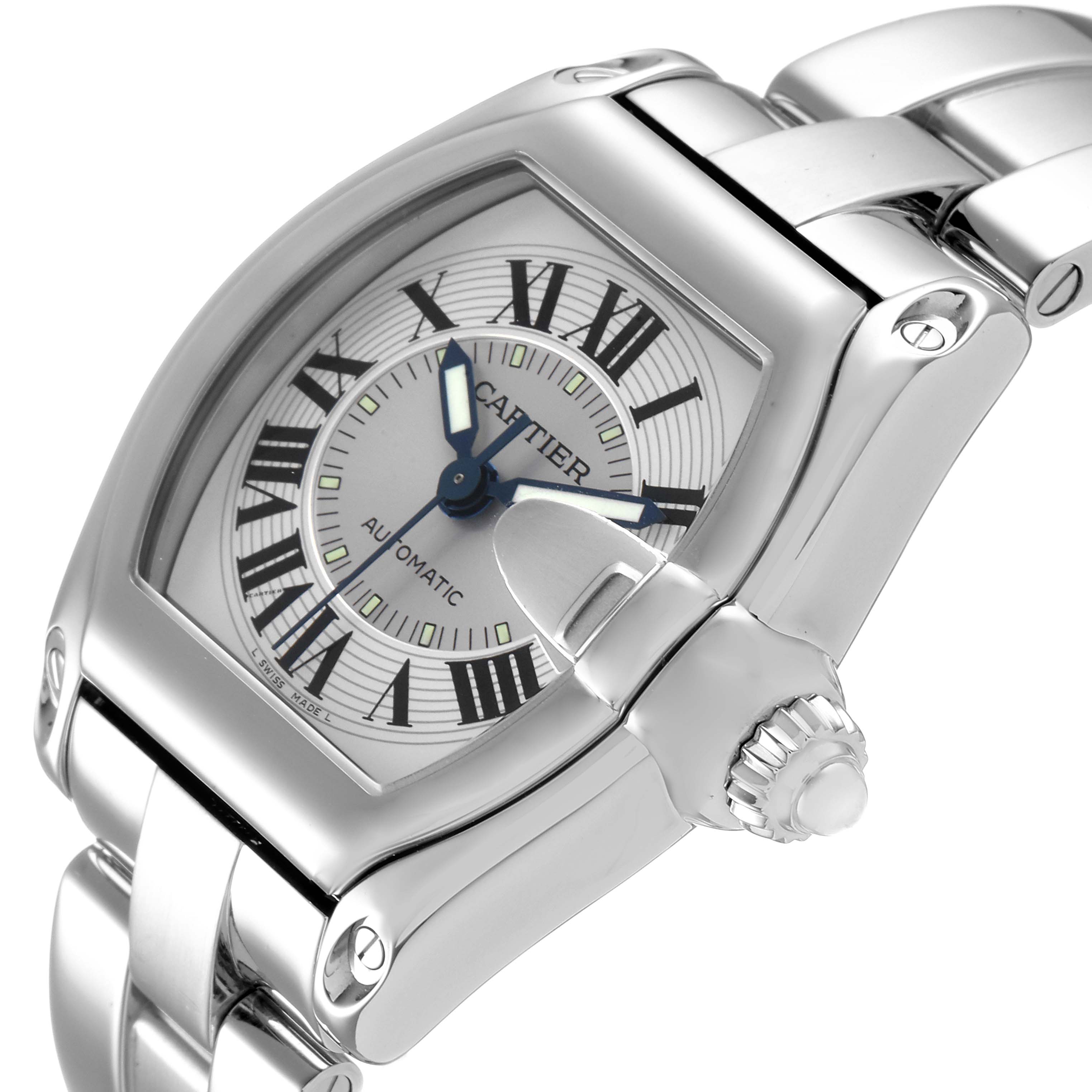 The image shows a close-up, angled view of a Cartier Roadster W62000V3 Men
s Stainless Steel Silver Dial W62000V3 Men
s Stainless Steel Silver Dial watch, highlighting the dial, crown, and part of the bracelet.
