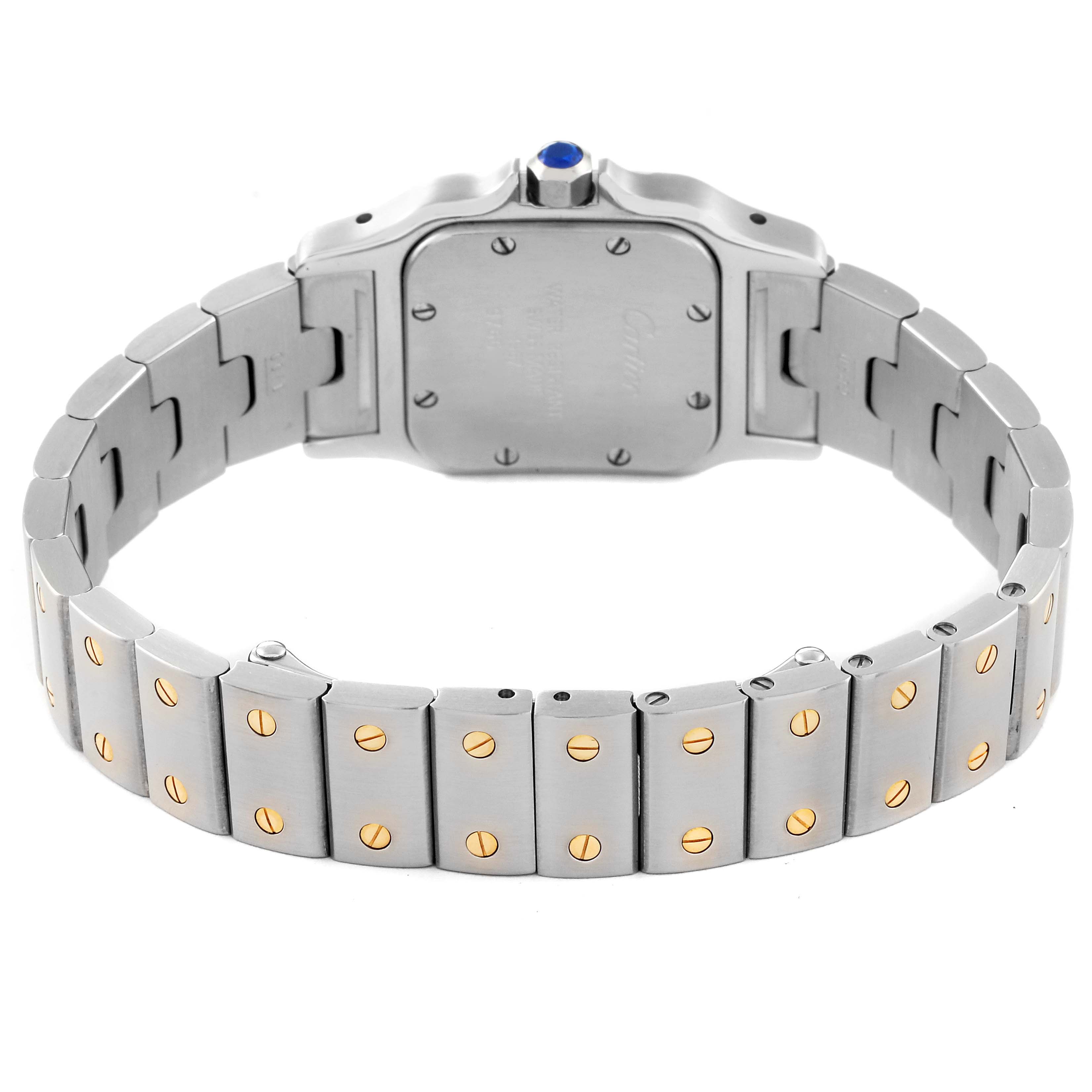 This image shows the backside and bracelet of a Cartier Santos W20012C4 Women's Steel and Gold (two tone) Silver Dial W20012C4 Women's Steel and Gold (two tone) Silver Dial watch, highlighting its screws and two-tone design.