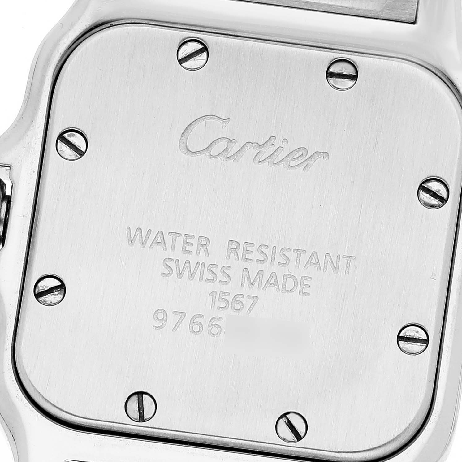 This image shows the back case of a Cartier Santos W20012C4 Women's Steel and Gold (two tone) Silver Dial W20012C4 Women's Steel and Gold (two tone) Silver Dial watch, highlighting the brand name, model details, and screws.