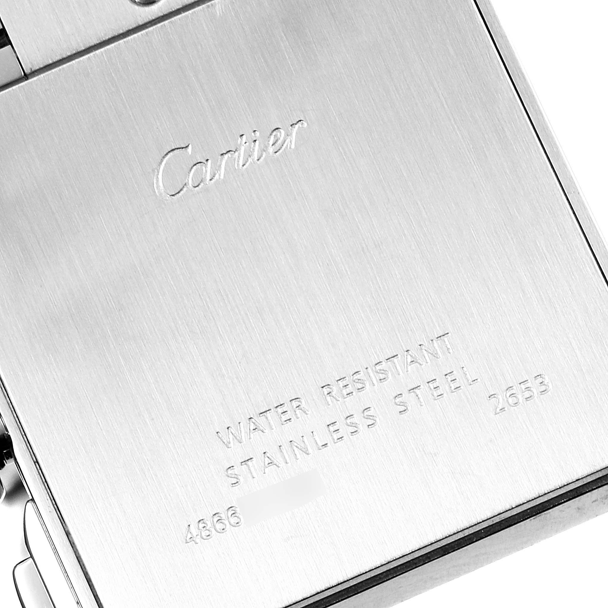 The image displays the back view of the Cartier Tank Francaise W51024Q3 Men's Stainless Steel Silver Dial W51024Q3 Men's Stainless Steel Silver Dial watch, showcasing its engravings and metal finish.
