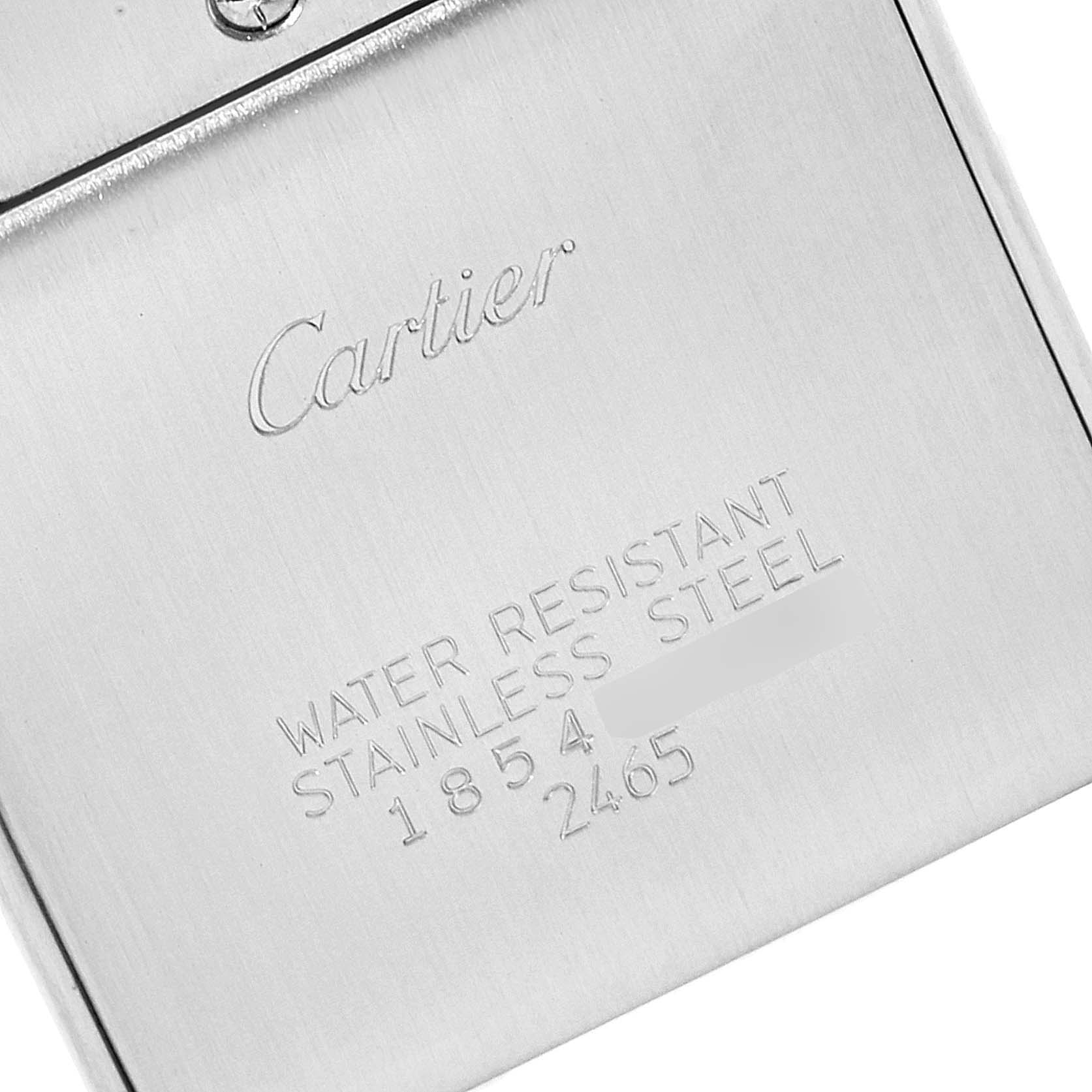 This image shows the back case of a Cartier Tank Francaise W51012Q4 Women's Steel and Gold (two tone) Silver Dial W51012Q4 Women's Steel and Gold (two tone) Silver Dial watch, displaying the brand name and specifications.