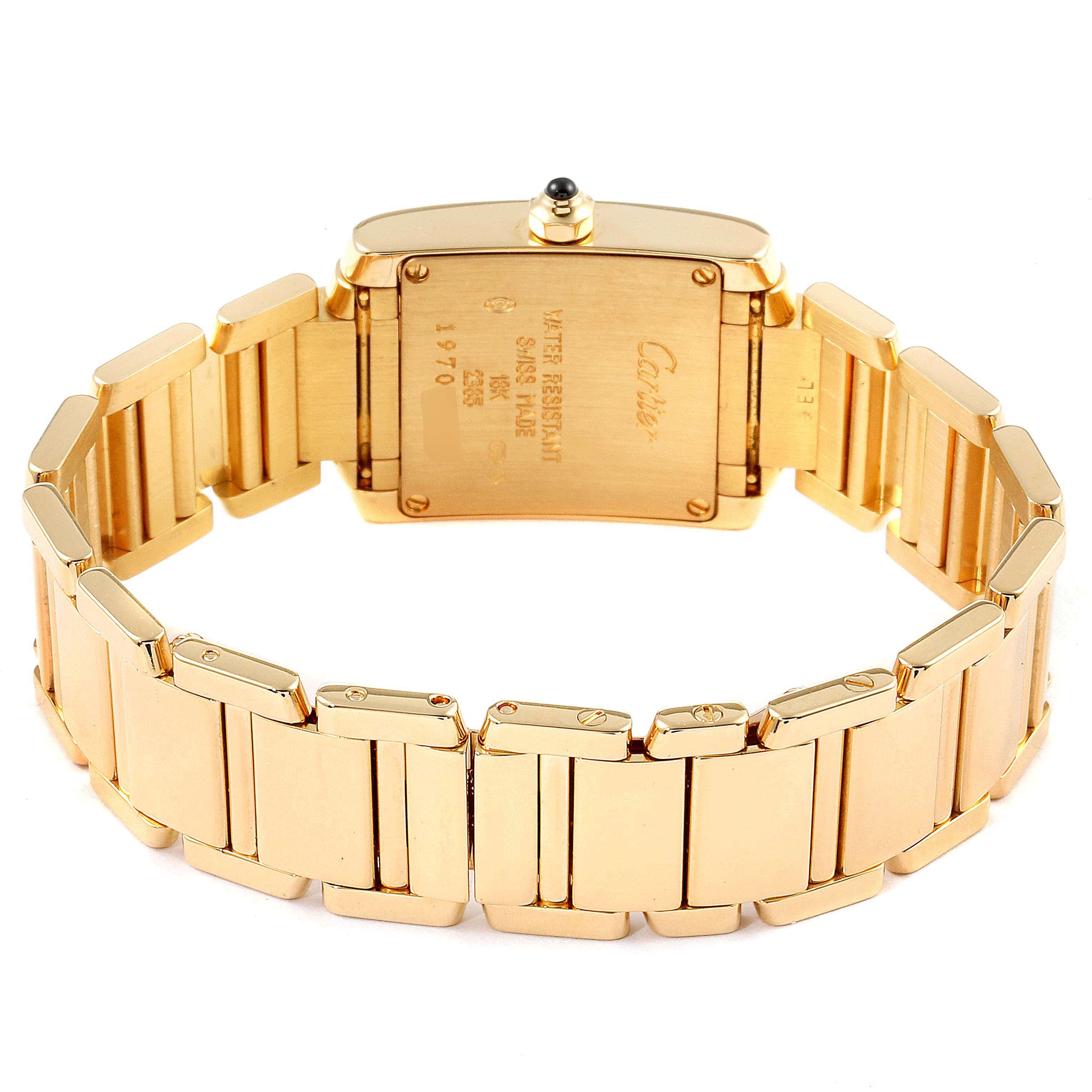 The image shows the back view of the Cartier Tank Française watch, highlighting the case back and gold bracelet.