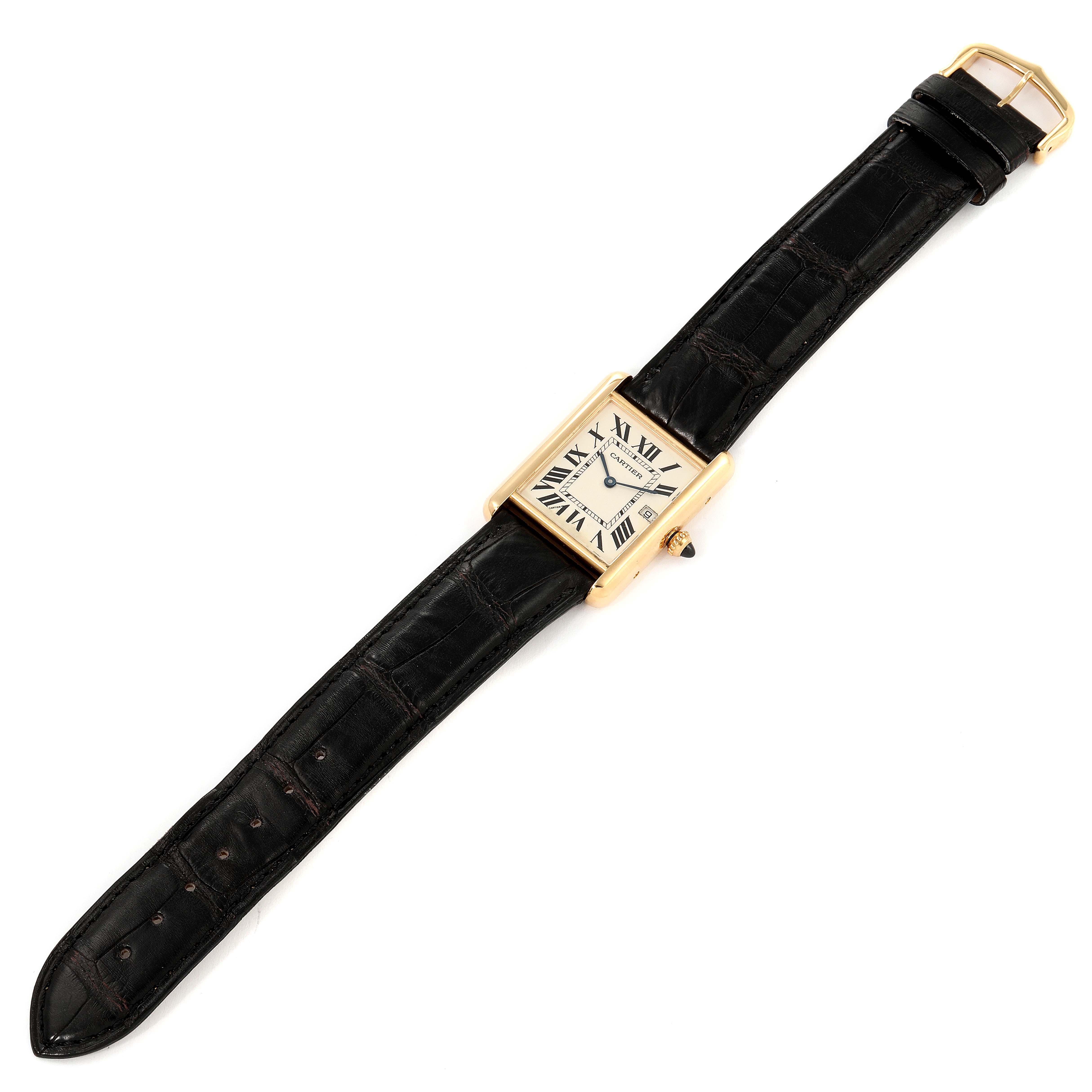 The Cartier Tank Louis W1529756 Men's Yellow Gold Silver Dial W1529756 Men's Yellow Gold Silver Dial watch is shown from a top-down angle, displaying the face, strap, and buckle.