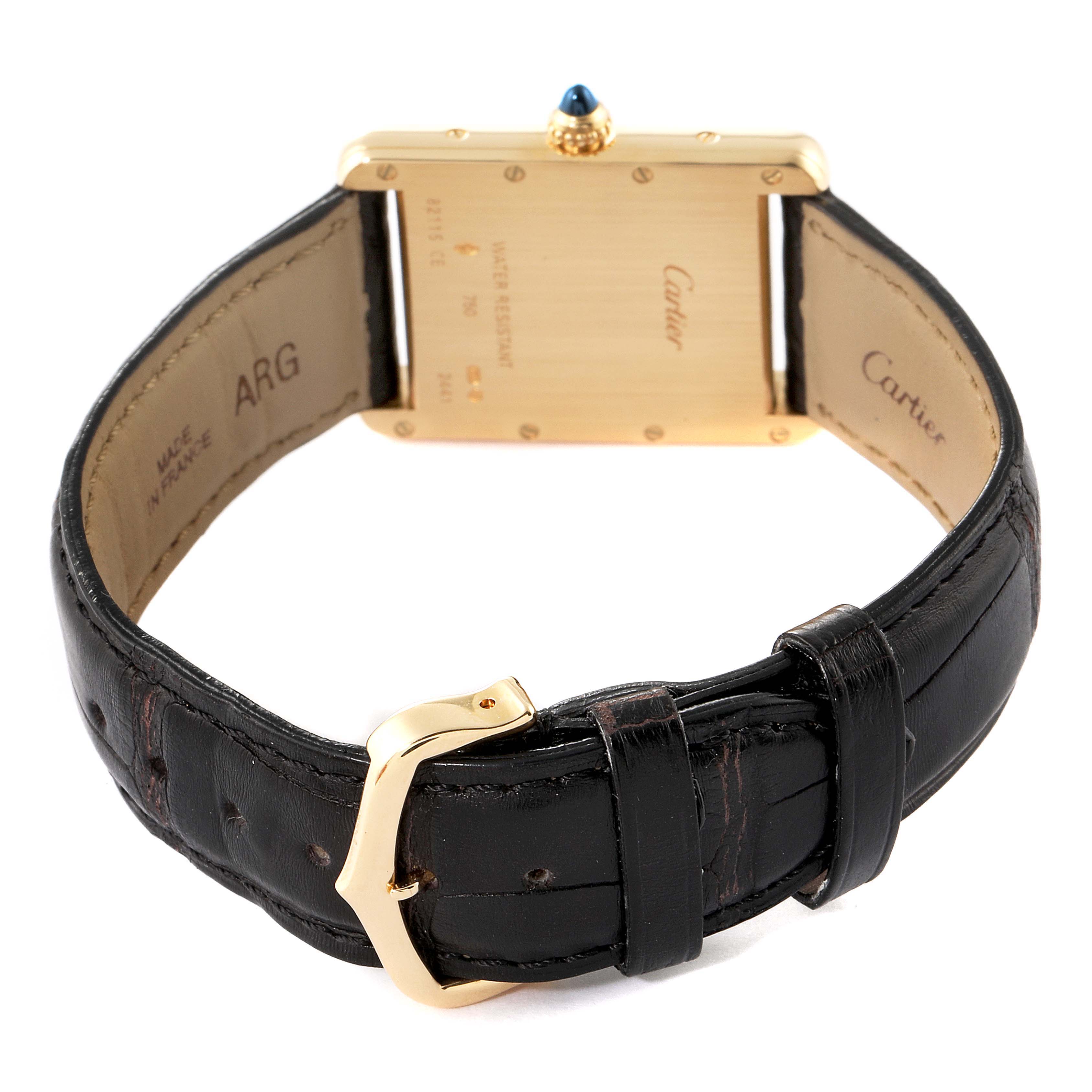 This image shows the back view of a Tank Louis model watch by Cartier, highlighting the strap, buckle, and caseback details.