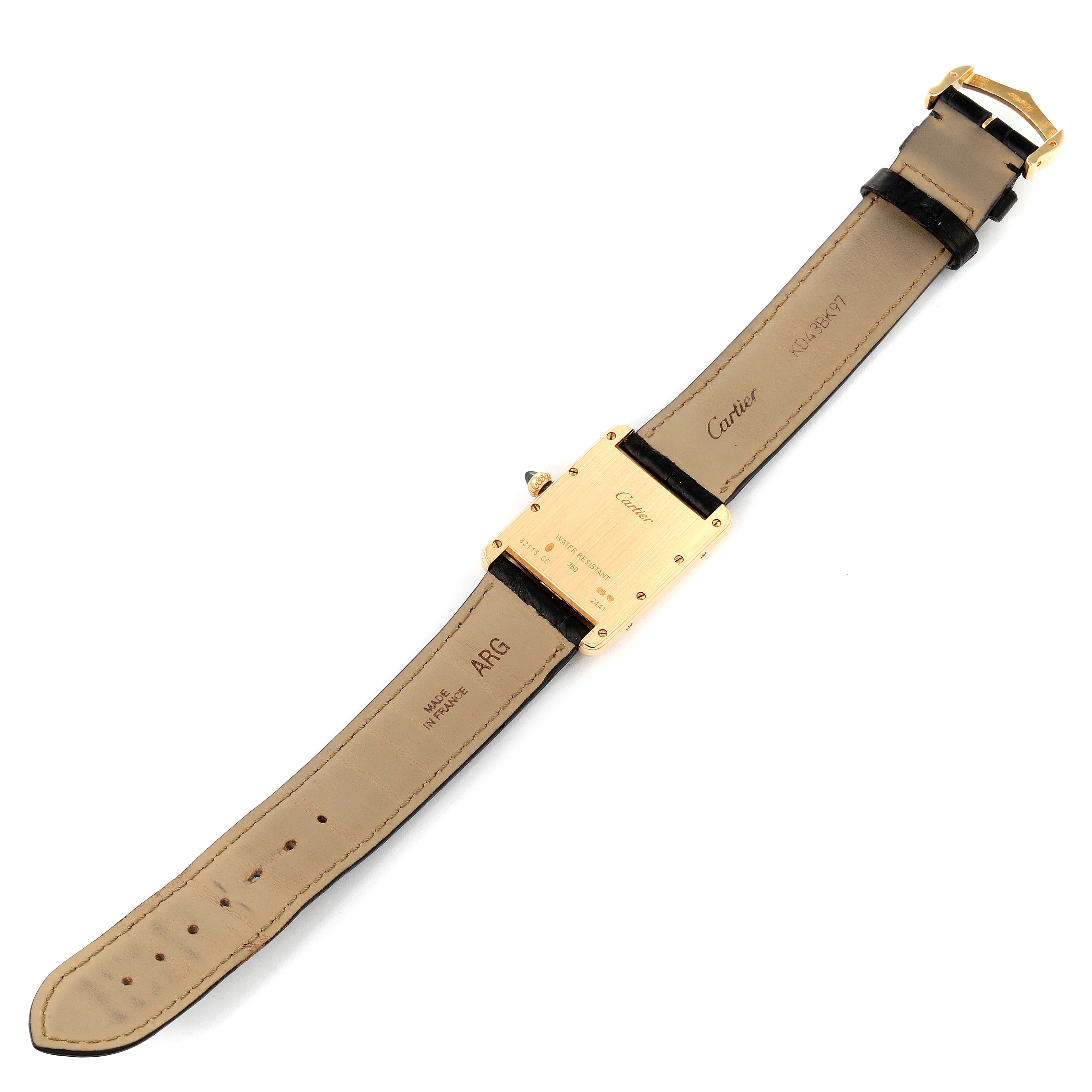 The image shows the back side of a Cartier Tank Louis W1529756 Men's Yellow Gold Silver Dial W1529756 Men's Yellow Gold Silver Dial watch laying flat, revealing the strap and back case details.