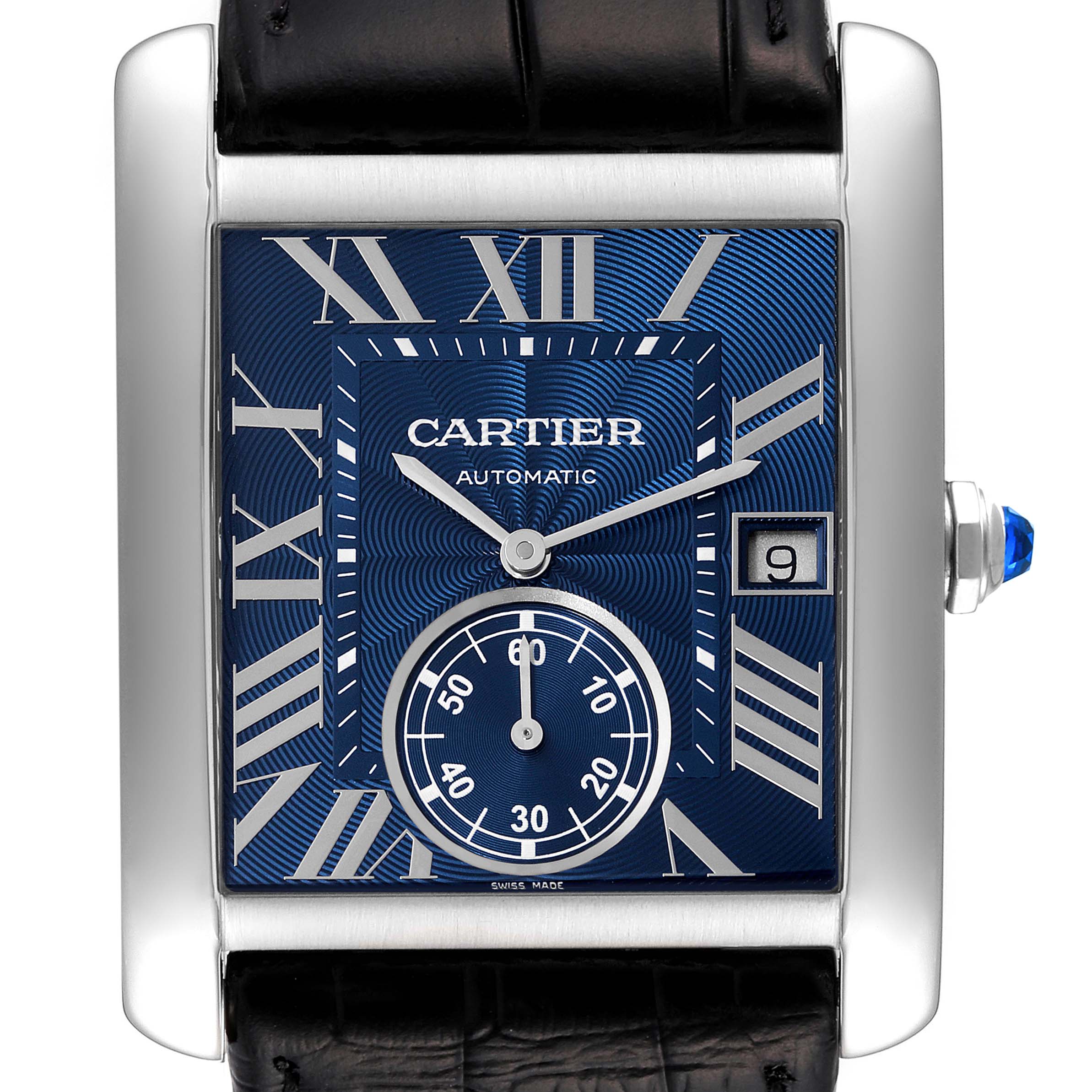 The image shows a frontal view of the Cartier Tank MC WSTA0010 Men's Stainless Steel Blue Dial WSTA0010 Men's Stainless Steel Blue Dial watch, highlighting its blue dial, Roman numerals, date window, and sub-dial.