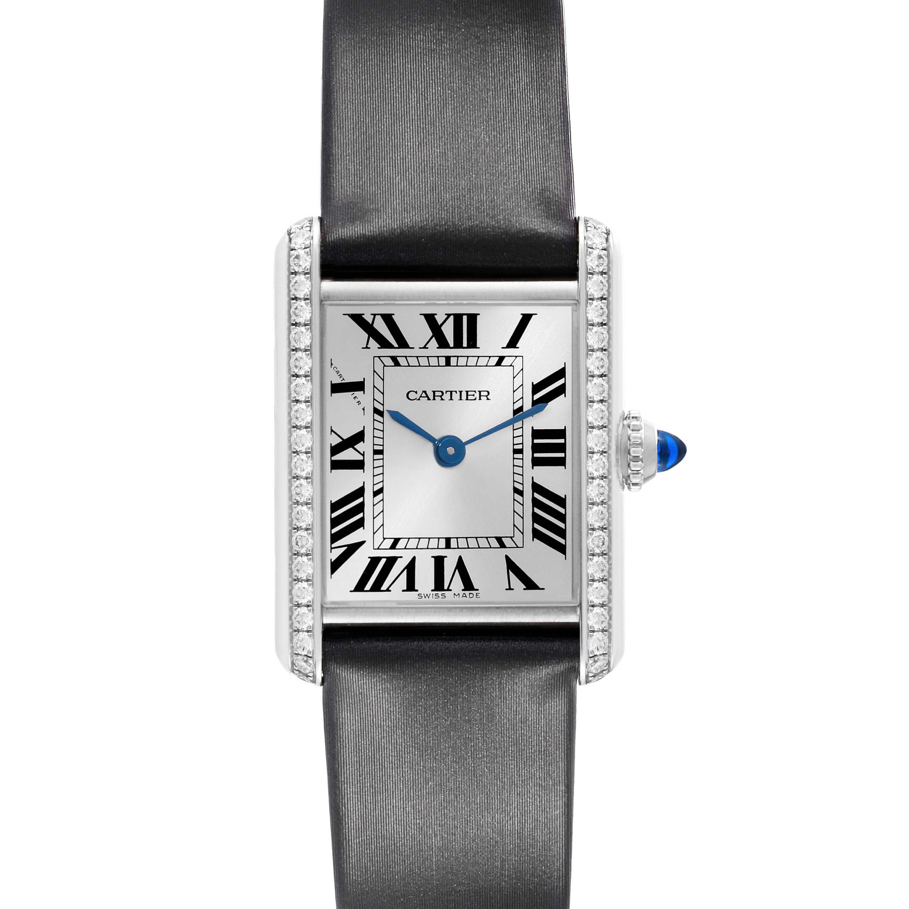 The Cartier Tank Must W4TA0016 Women's Stainless Steel Silver Dial watch is shown from the front, highlighting the dial, Roman numerals, and distinctive blue hands.