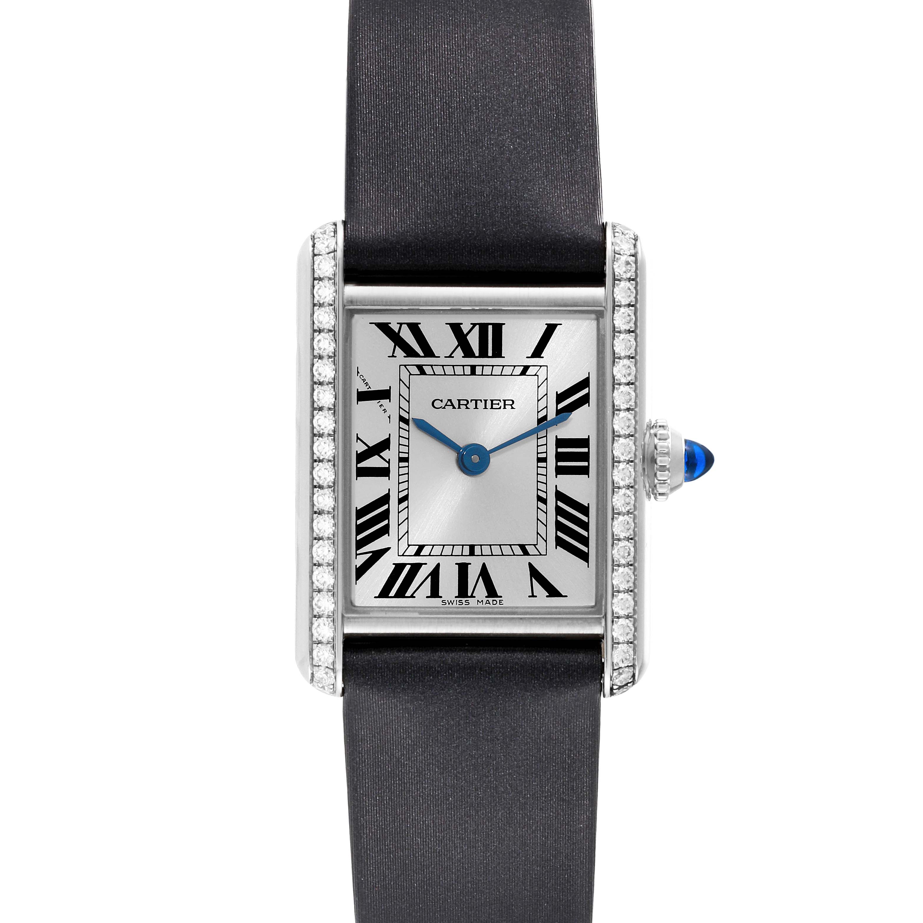 The image shows a front view of the Cartier Tank Must W4TA0016 Women's Stainless Steel Silver Dial W4TA0016 Women's Stainless Steel Silver Dial watch, highlighting its rectangular face, blue hands, and Roman numerals.
