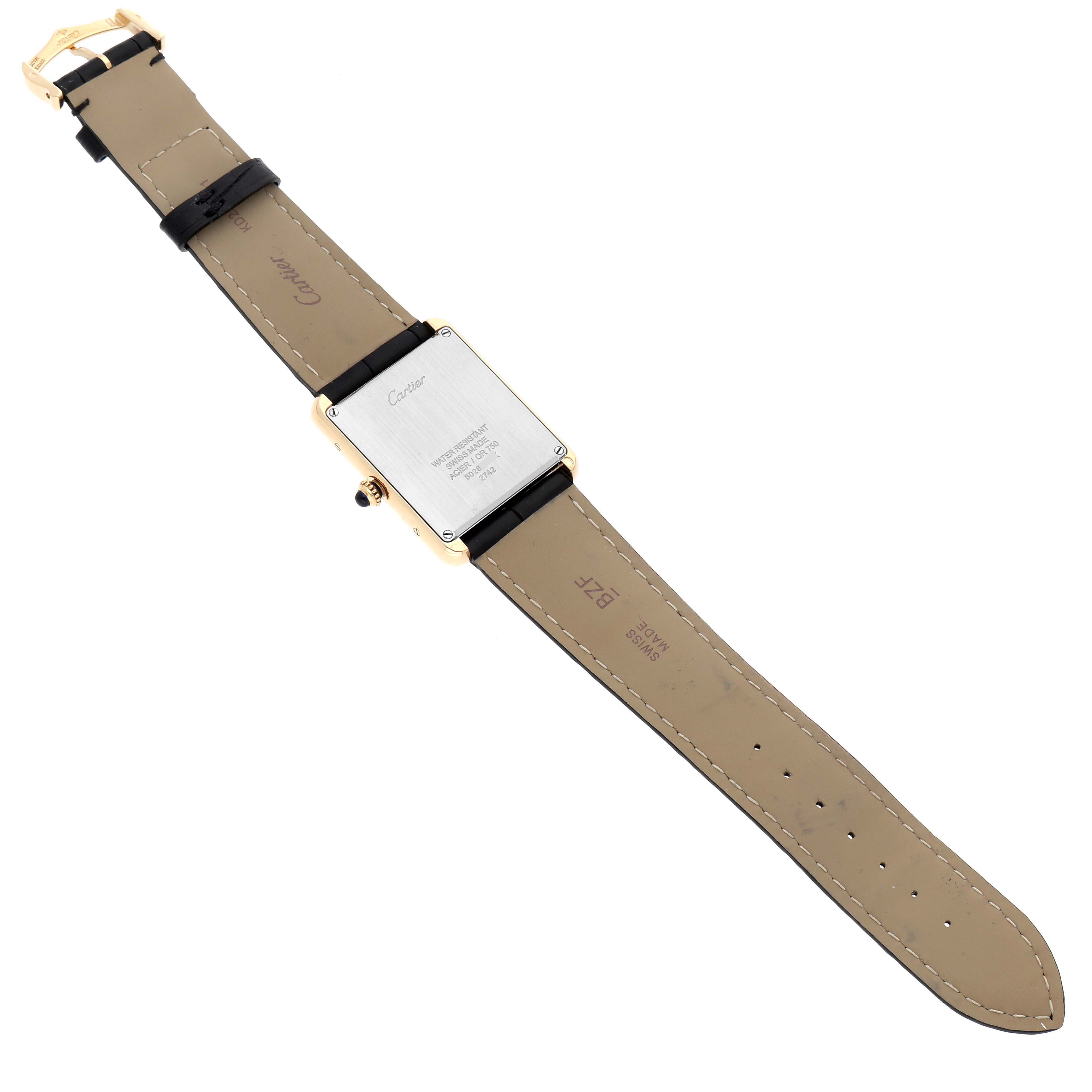 This image shows the back view of a Cartier Tank Solo W1018855 Men's Steel and Gold (two tone) Silver Dial W1018855 Men's Steel and Gold (two tone) Silver Dial watch, displaying its strap and case back.