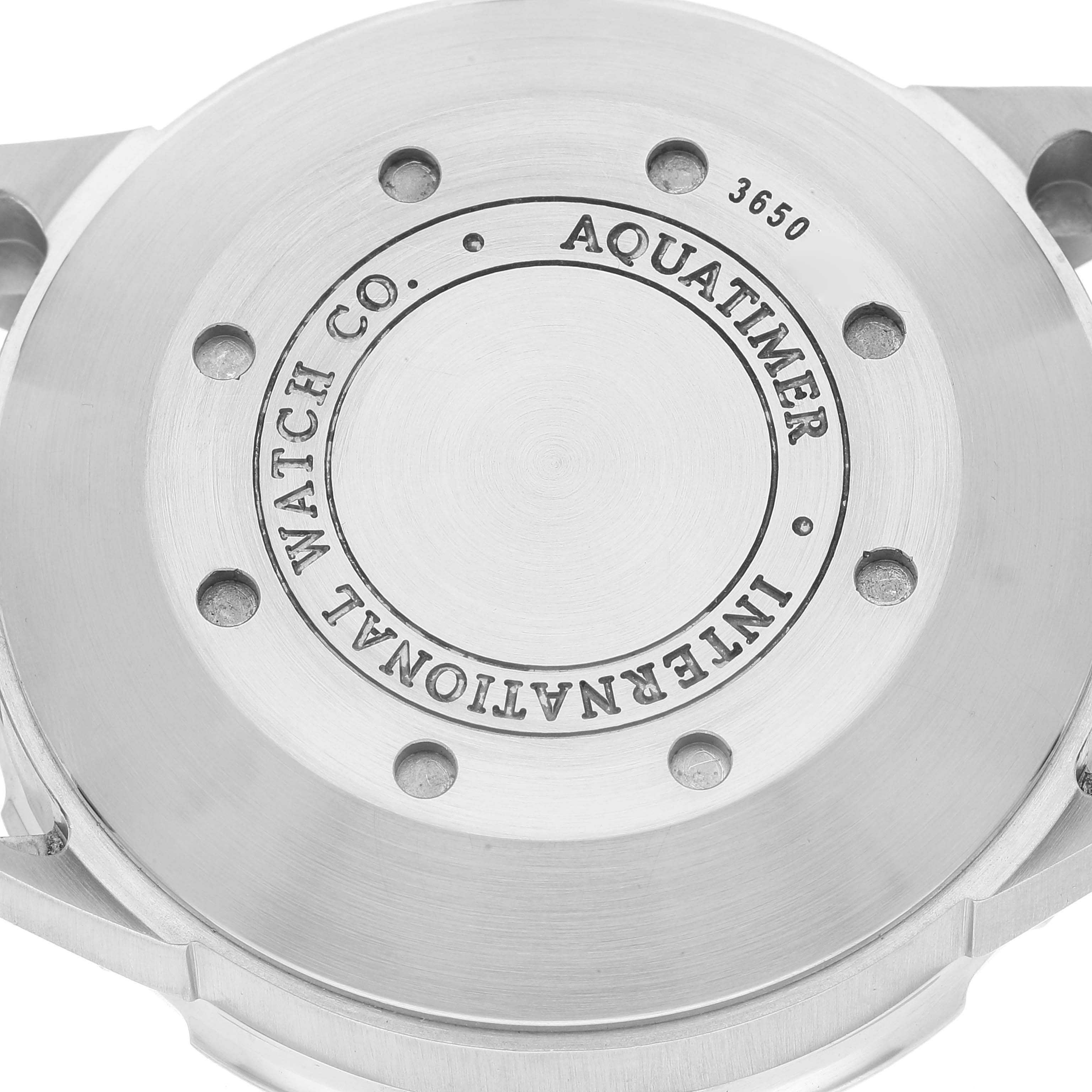 The image displays the case back of an IWC Aquatimer IW356805 Men's Stainless Steel White Dial IW356805 Men's Stainless Steel White Dial watch, with visible engravings and screws.