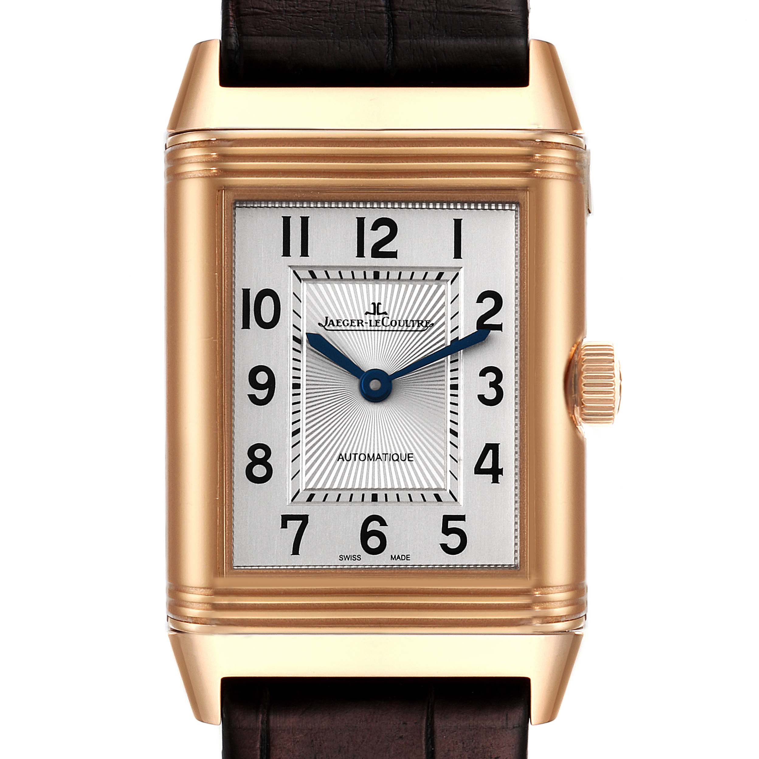 The image shows a frontal view of a Jaeger-LeCoultre Reverso watch, highlighting the dial, hands, case, and part of the strap.