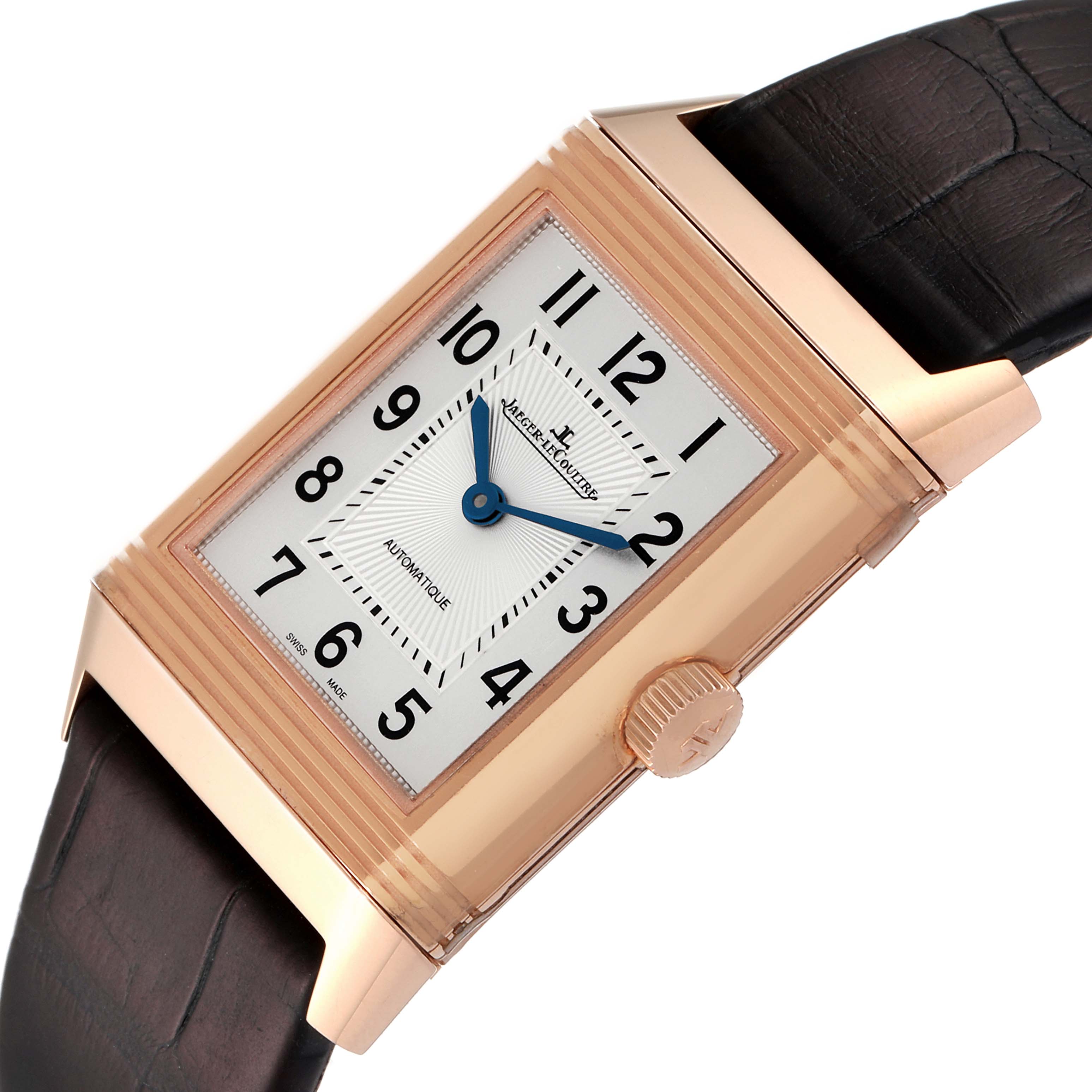 The image shows a front view of the Jaeger-LeCoultre Reverso watch, highlighting its rectangular face, crown, and leather strap.