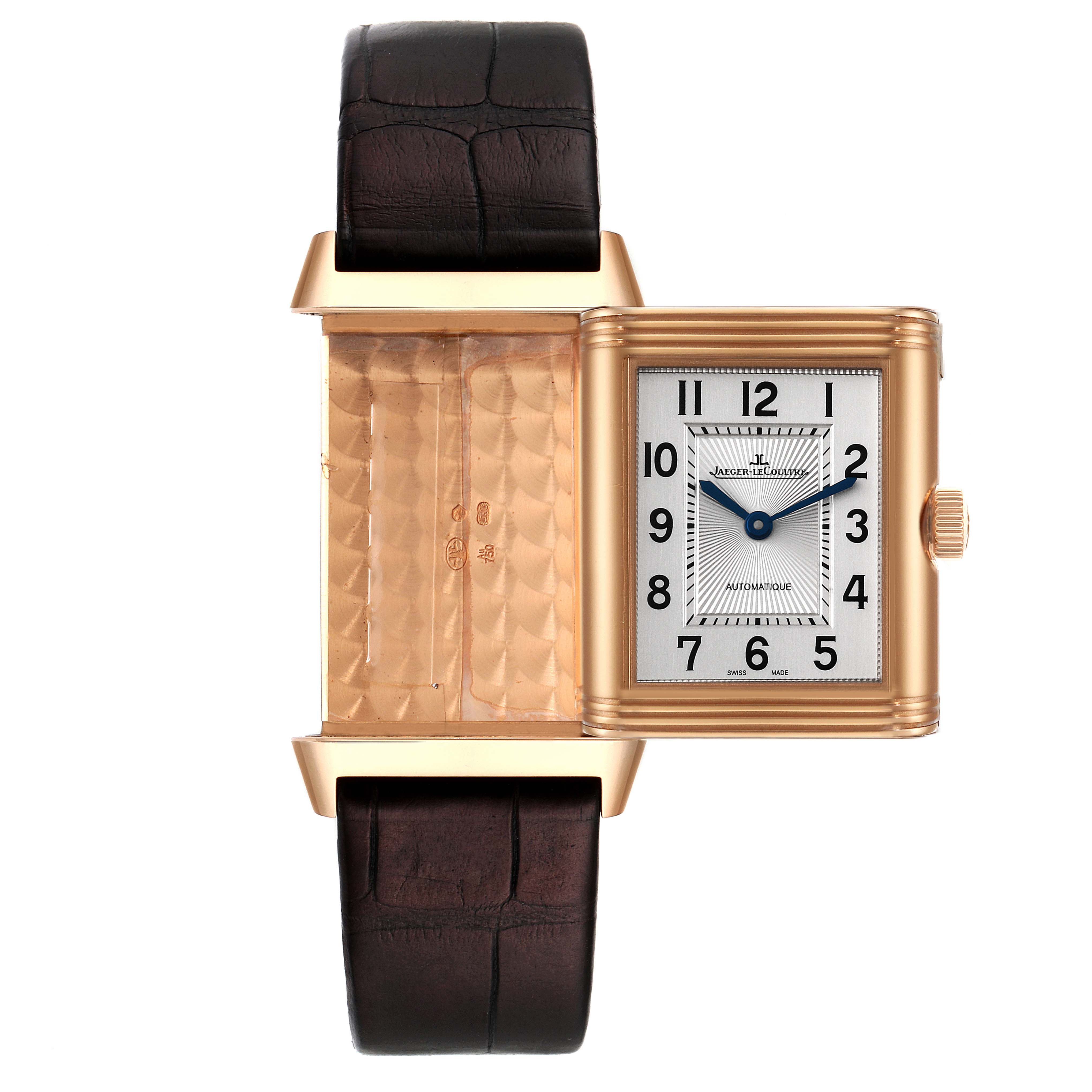 The image shows a Jaeger LeCoultre Reverso Q2572420 Men's Rose Gold Silver Dial Q2572420 Men's Rose Gold Silver Dial watch with its case partially opened, revealing the backside of the dial and inner mechanism.