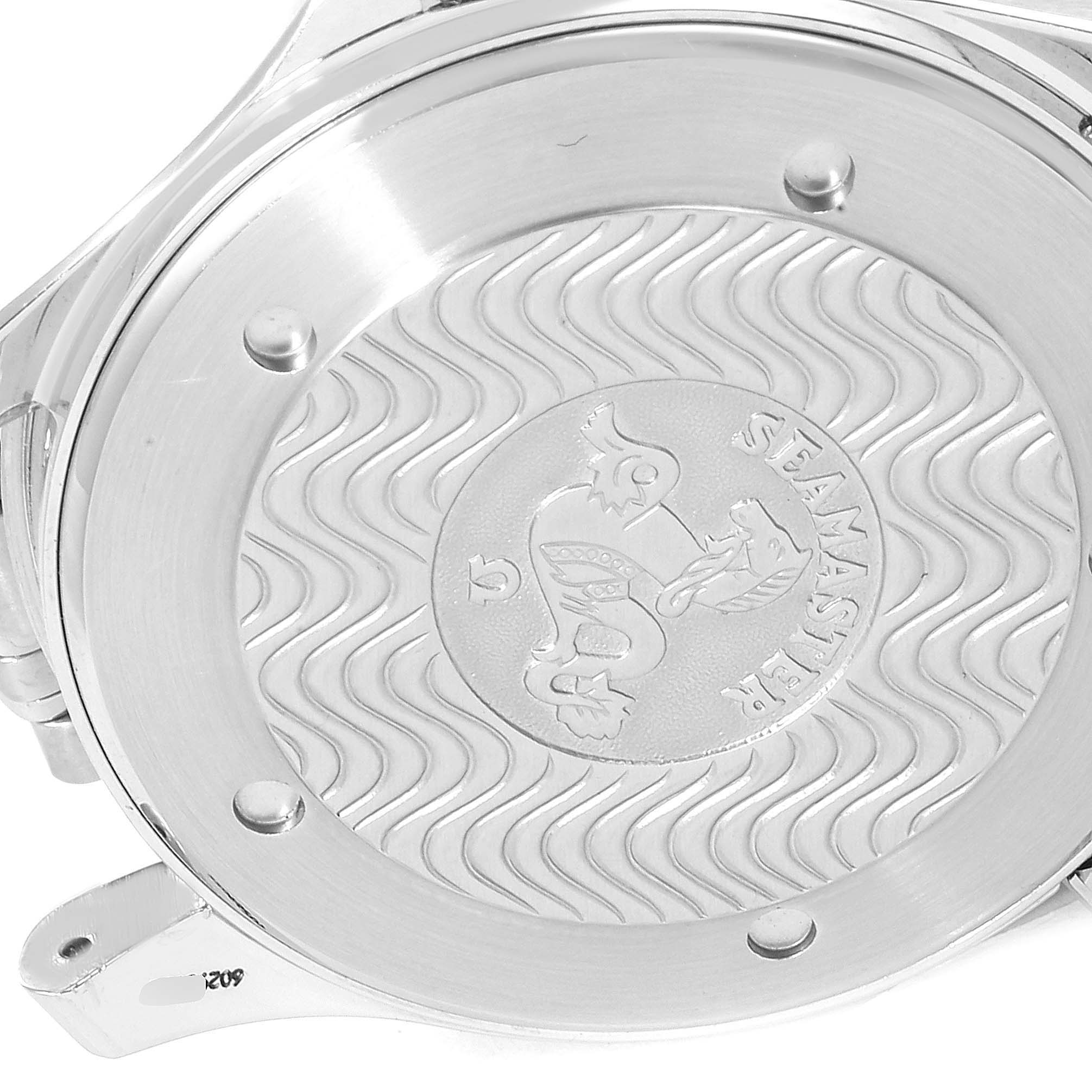 The image shows the back case of an Omega Seamaster 2532.80.00 Men
s Stainless Steel Blue Dial 2532.80.00 Men
s Stainless Steel Blue Dial watch, highlighting the embossed logo and wave pattern.