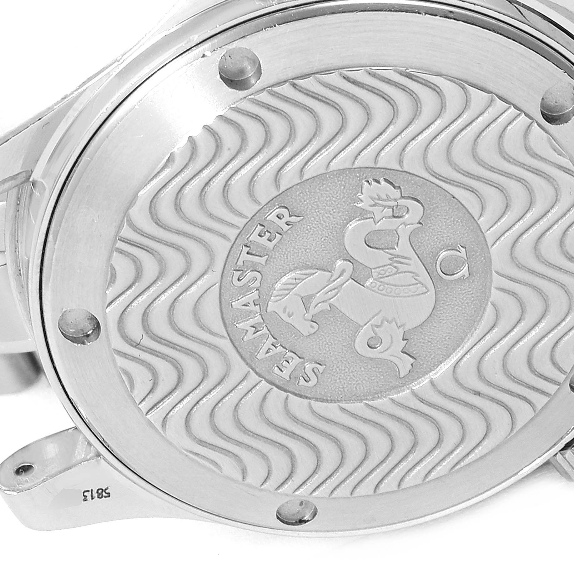 The image shows the case back of the Omega Seamaster 2263.80.00 Men
s Stainless Steel Blue Dial 2263.80.00 Men
s Stainless Steel Blue Dial watch, featuring the signature wavy pattern and Engraved branding.