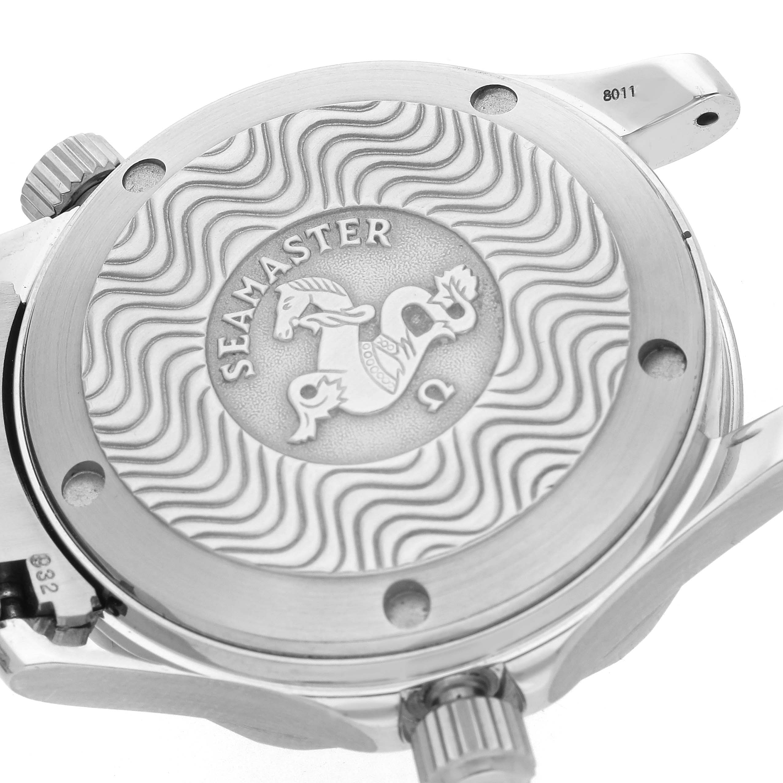 The image shows the back of an Omega Seamaster 2252.50.00 Men
s Stainless Steel Black Dial 2252.50.00 Men
s Stainless Steel Black Dial watch, featuring engraved wave patterns and the logo.