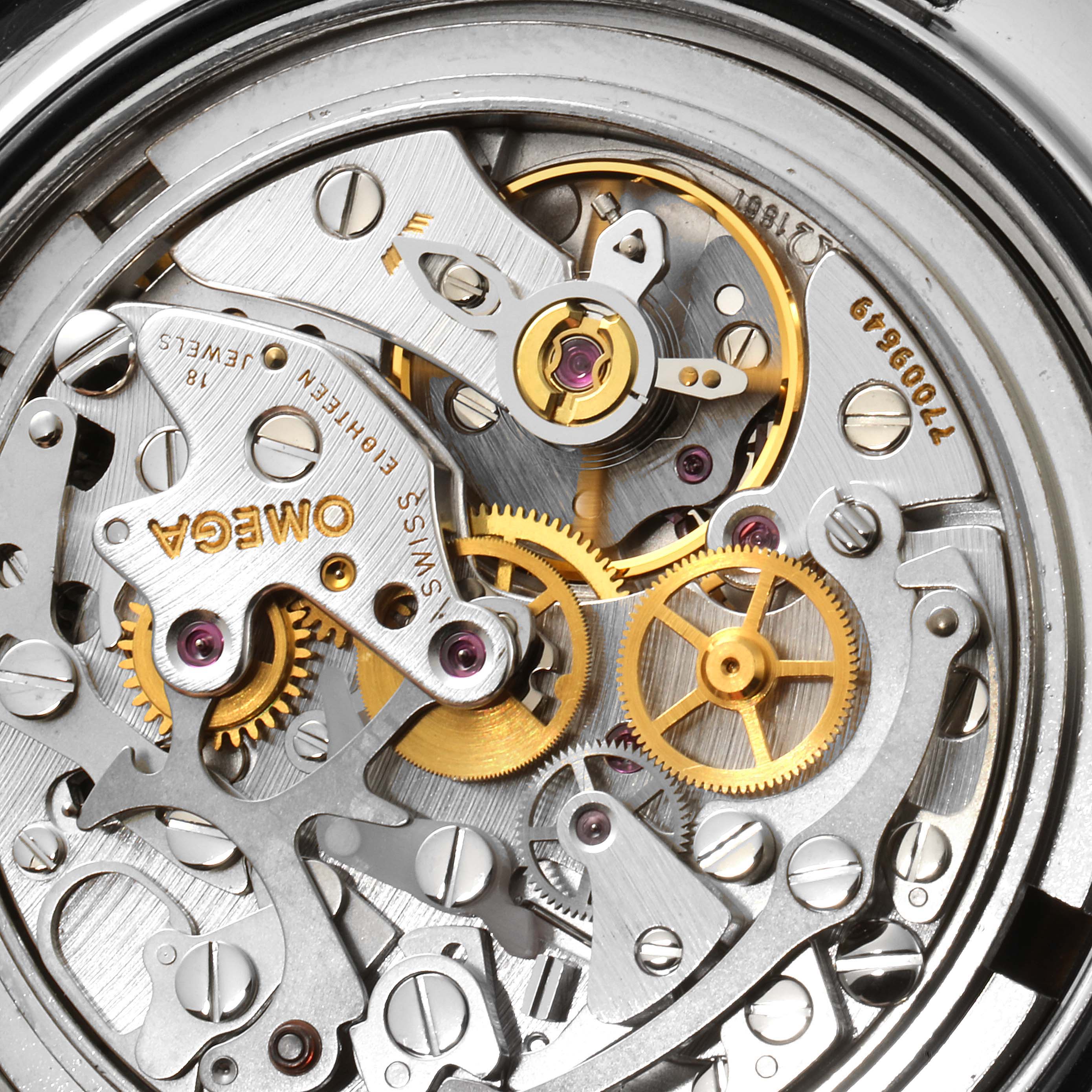 Close-up of the movement inside an Omega Speedmaster 3560.50.00 Men
s Stainless Steel Black Dial 3560.50.00 Men
s Stainless Steel Black Dial watch, featuring intricate gears and mechanisms.