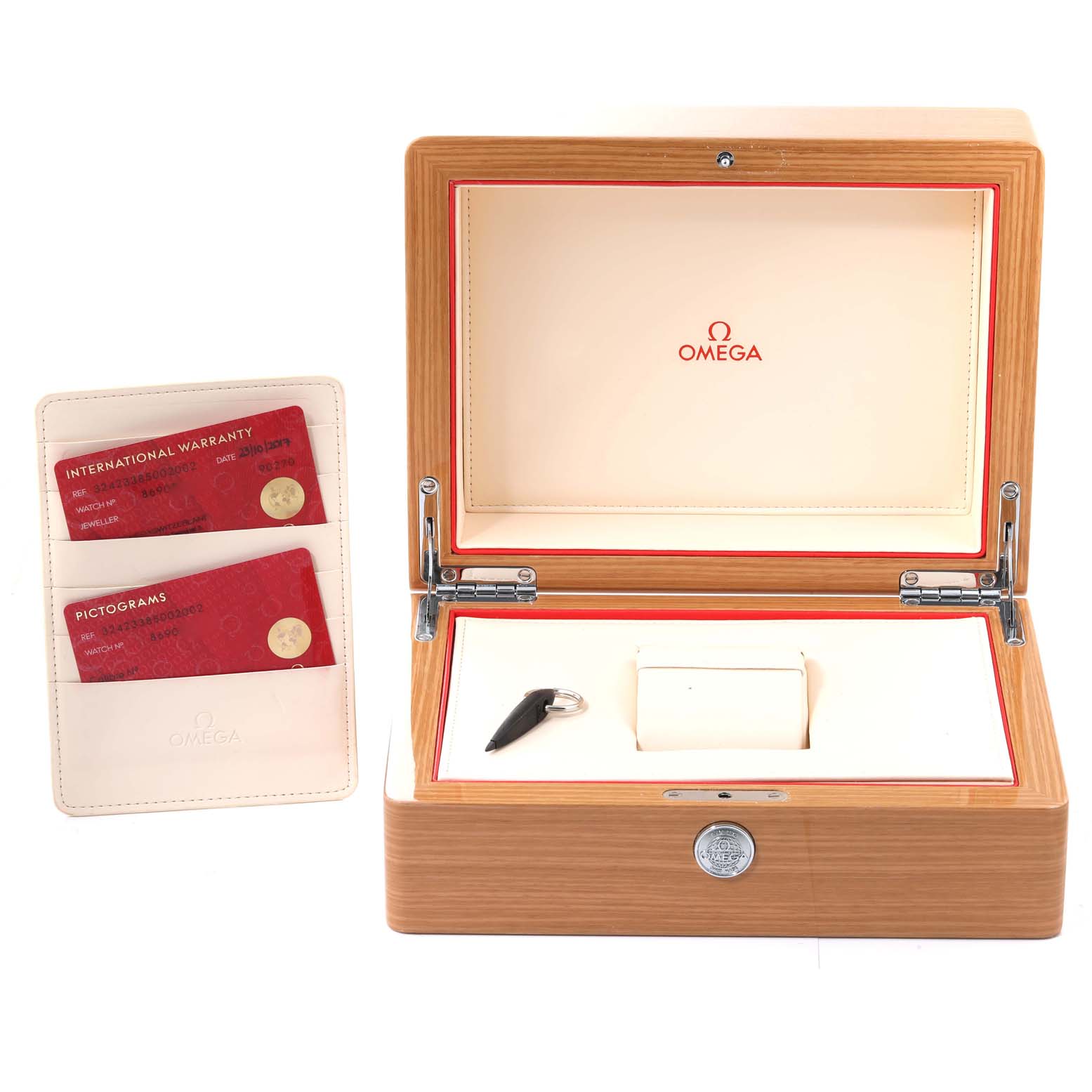 The image shows the open presentation box of an Omega Speedmaster 324.23.38.50.02.002 Men's Steel and Gold (two tone) Silver Dial 324.23.38.50.02.002 Men's Steel and Gold (two tone) Silver Dial watch, its key, and warranty documentation from a straight-on angle.