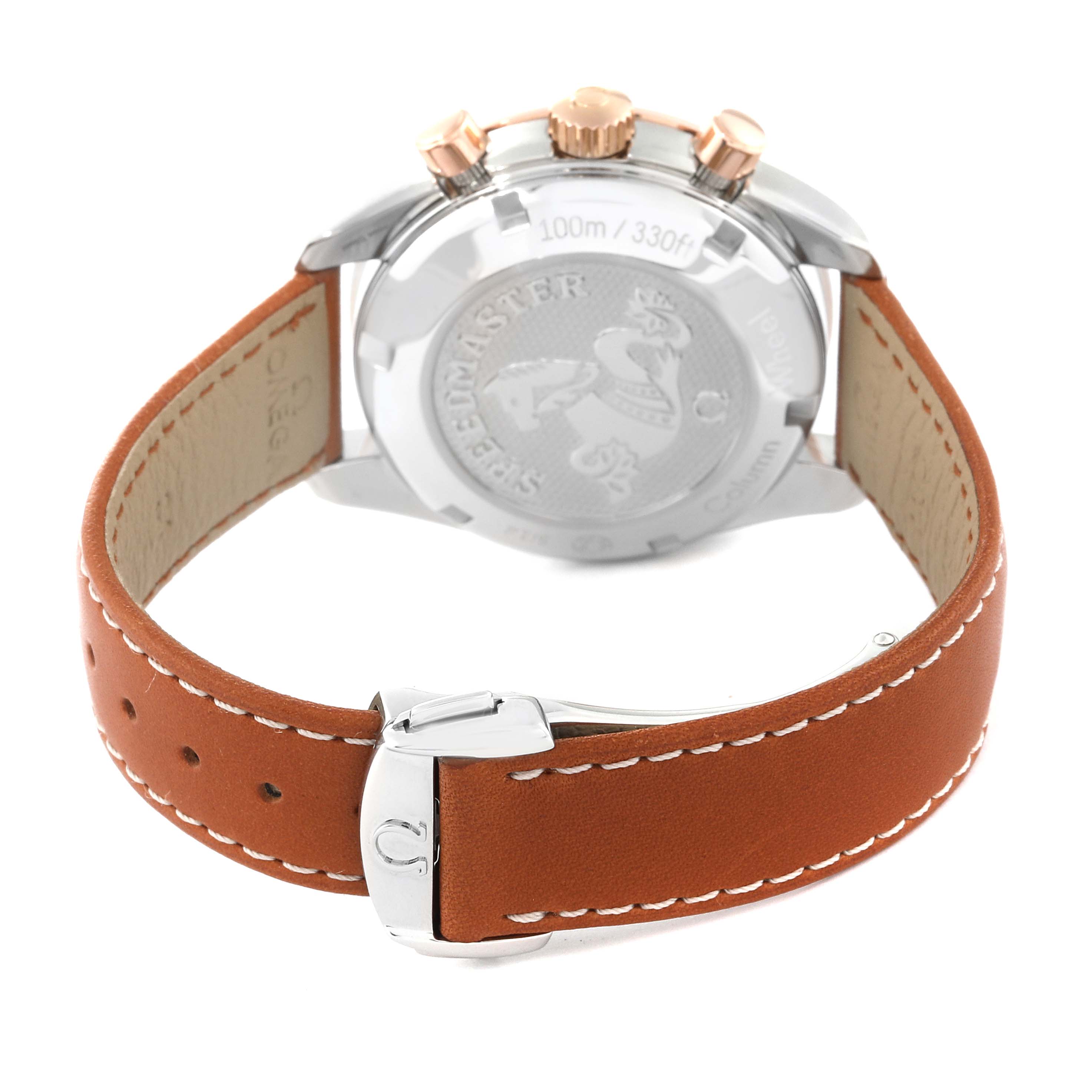 This image shows the back, crown, and leather strap of an Omega Speedmaster 324.23.38.50.02.002 Men's Steel and Gold (two tone) Silver Dial 324.23.38.50.02.002 Men's Steel and Gold (two tone) Silver Dial watch.