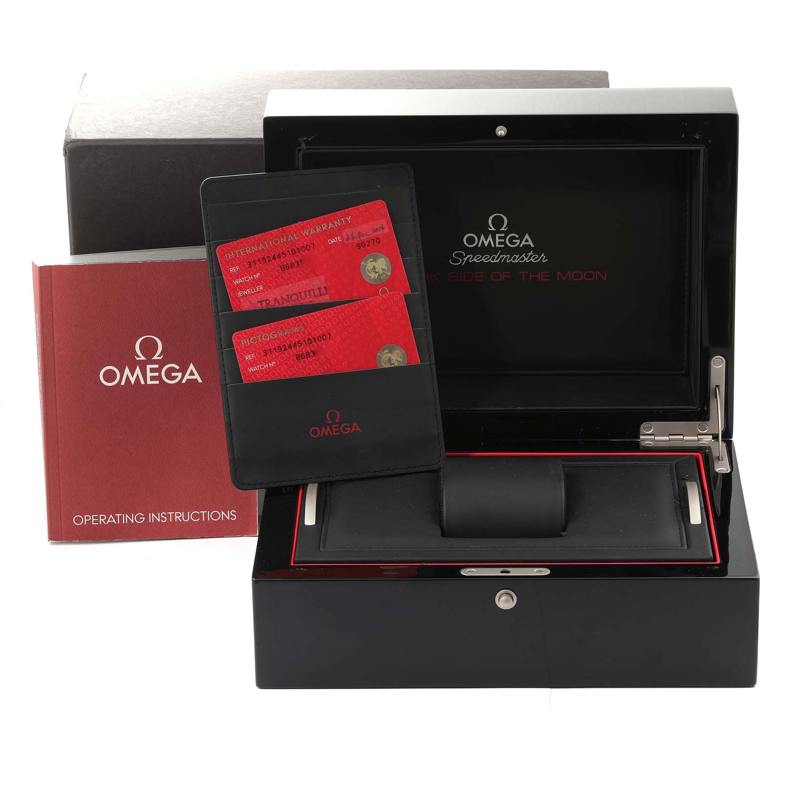 The image shows an Omega Speedmaster 311.92.44.51.01.007 Men
s Ceramic Black Dial 311.92.44.51.01.007 Men
s Ceramic Black Dial box, warranty cards, and operating instructions, viewed from the front.