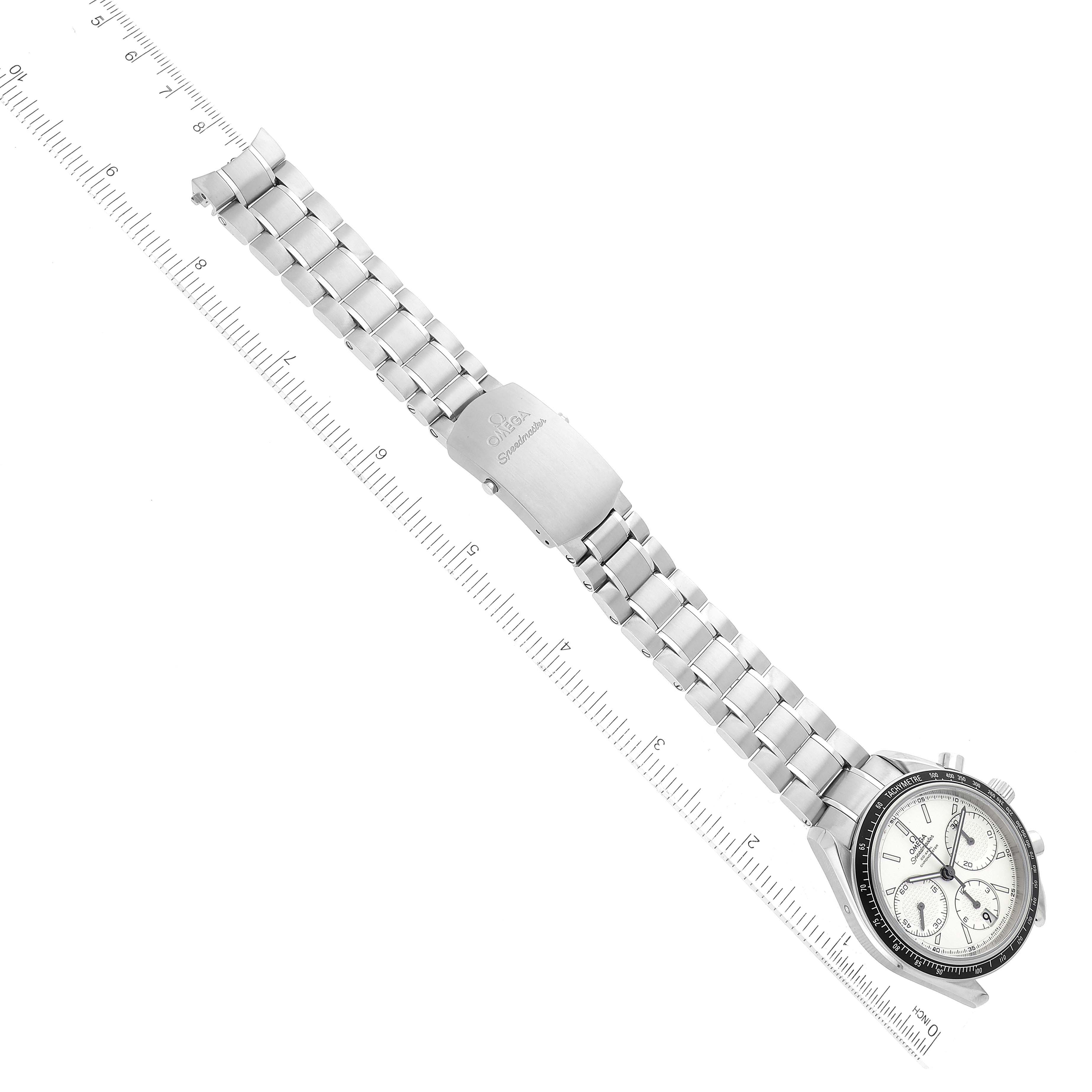 The image shows an Omega Speedmaster 326.30.40.50.02.001 Men
s Stainless Steel Silver Dial 326.30.40.50.02.001 Men
s Stainless Steel Silver Dial watch laid flat with its entire bracelet visible, alongside a ruler for scale.